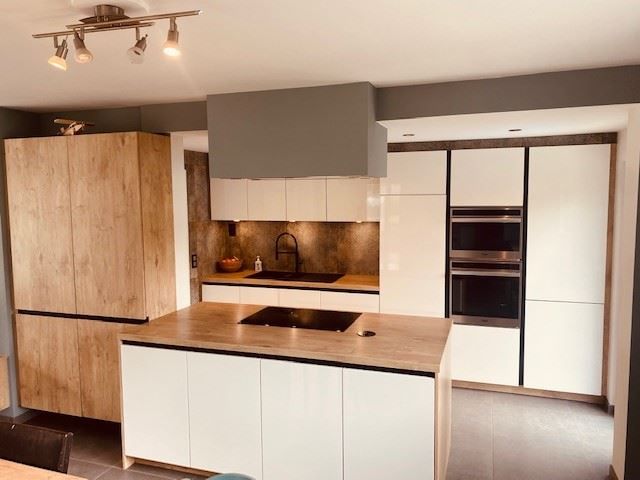Gezellige halfopen woning met grote tuin foto {{pictureIndex}}