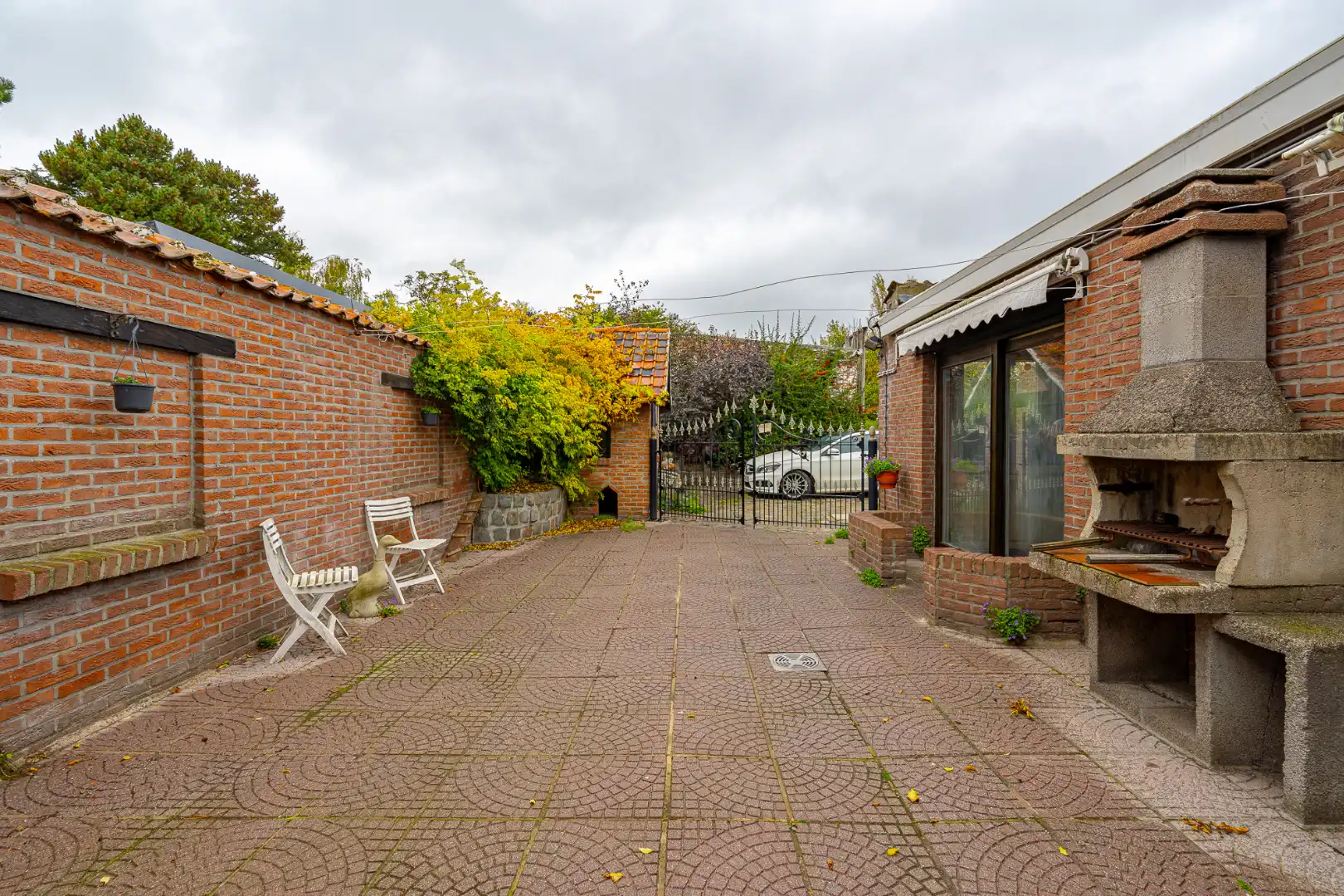 Hoekwoning met handelsruimte/etalage en achterliggende garages in Wevelgem foto 12