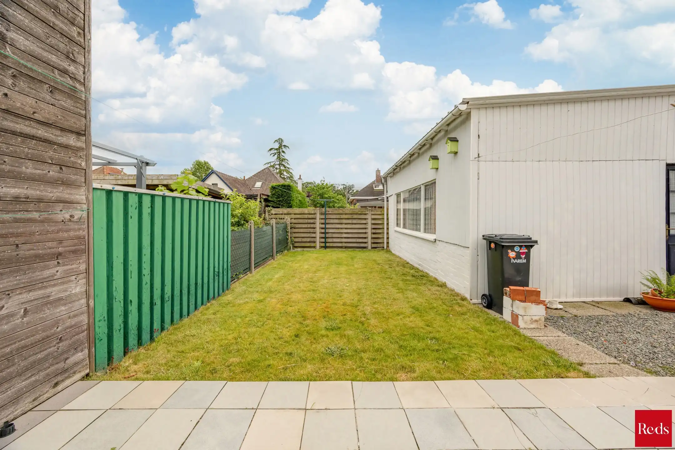  Halfopen bebouwing met tuin en garage foto 12