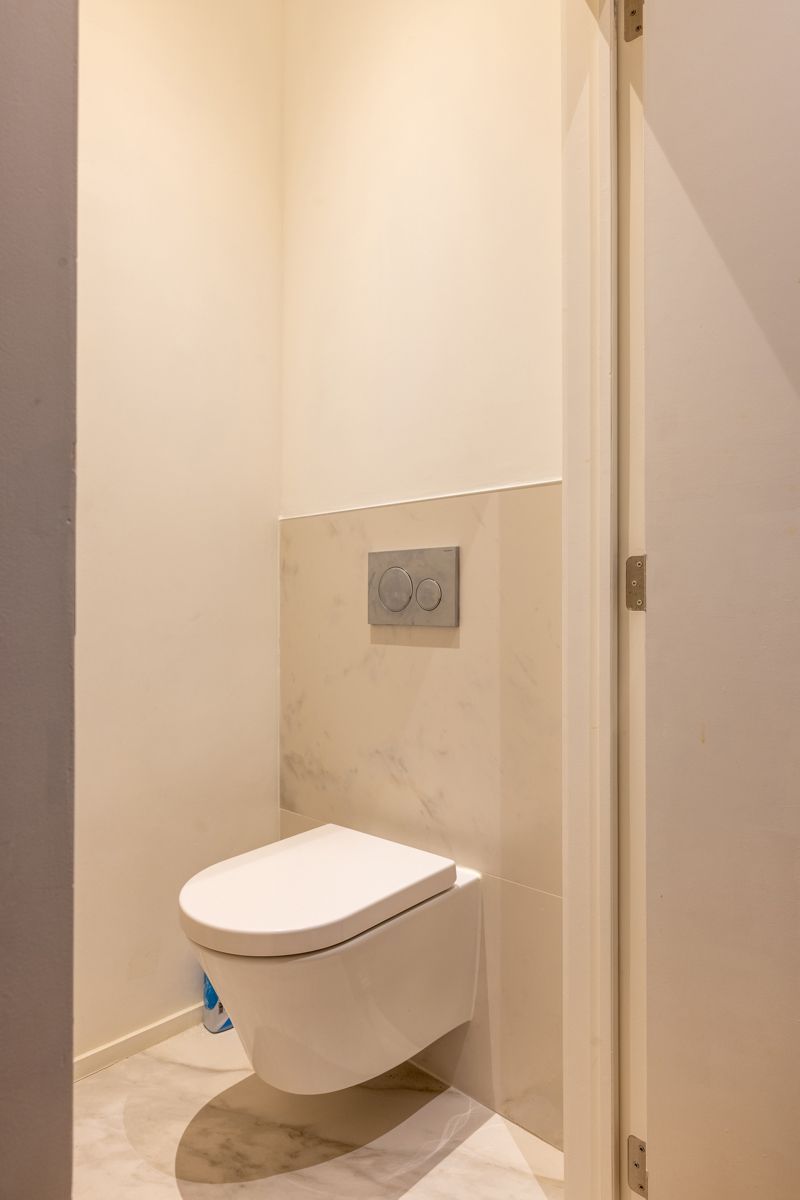 Groot drieslaapkamerappartement met 2 ruime dakterrassen! foto 16