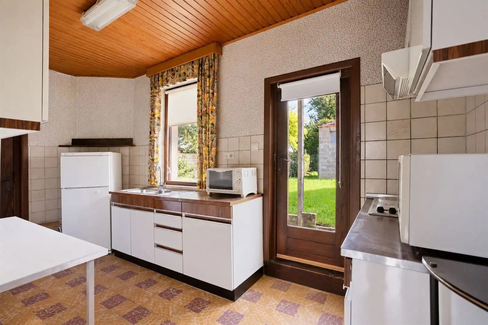 Gezellige, te renoveren, woning met aangename tuin foto 9