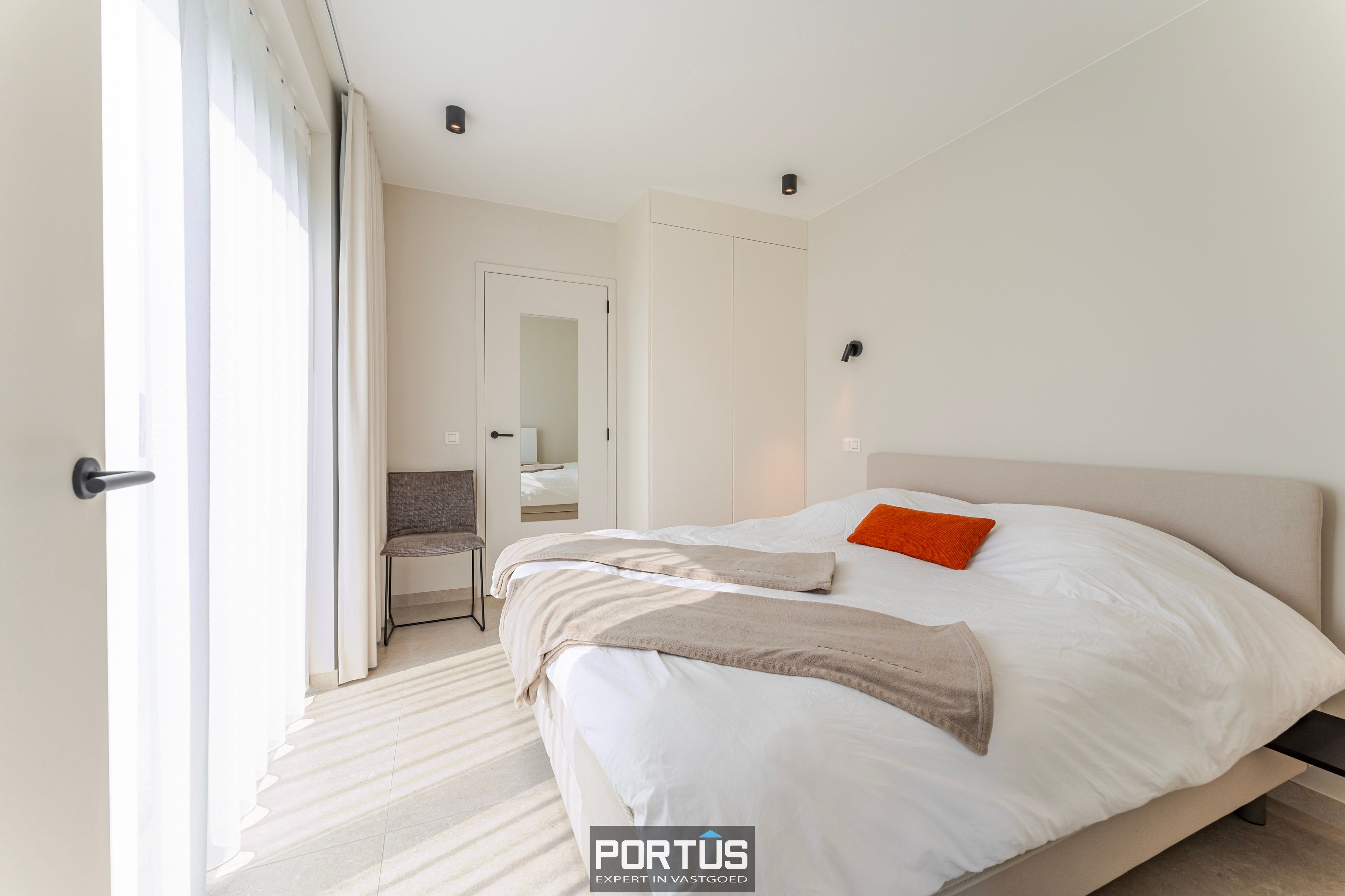 Recent instapklaar gelijkvloers appartement met 2 slaapkamers te koop foto 14