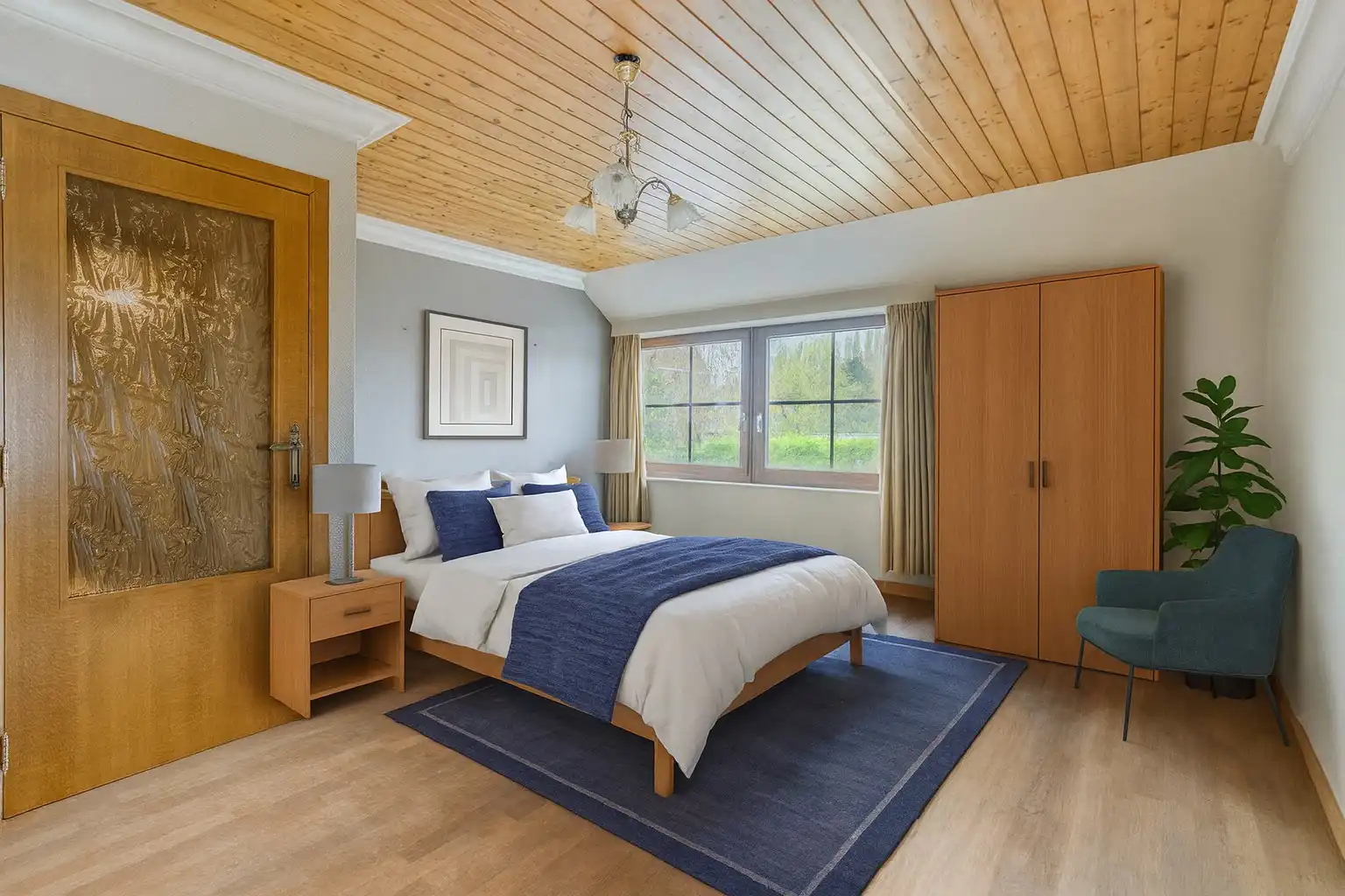 Bijzonder ruime woning met inpandige garage en 3 slks op een perceel van 1218 m². foto 14