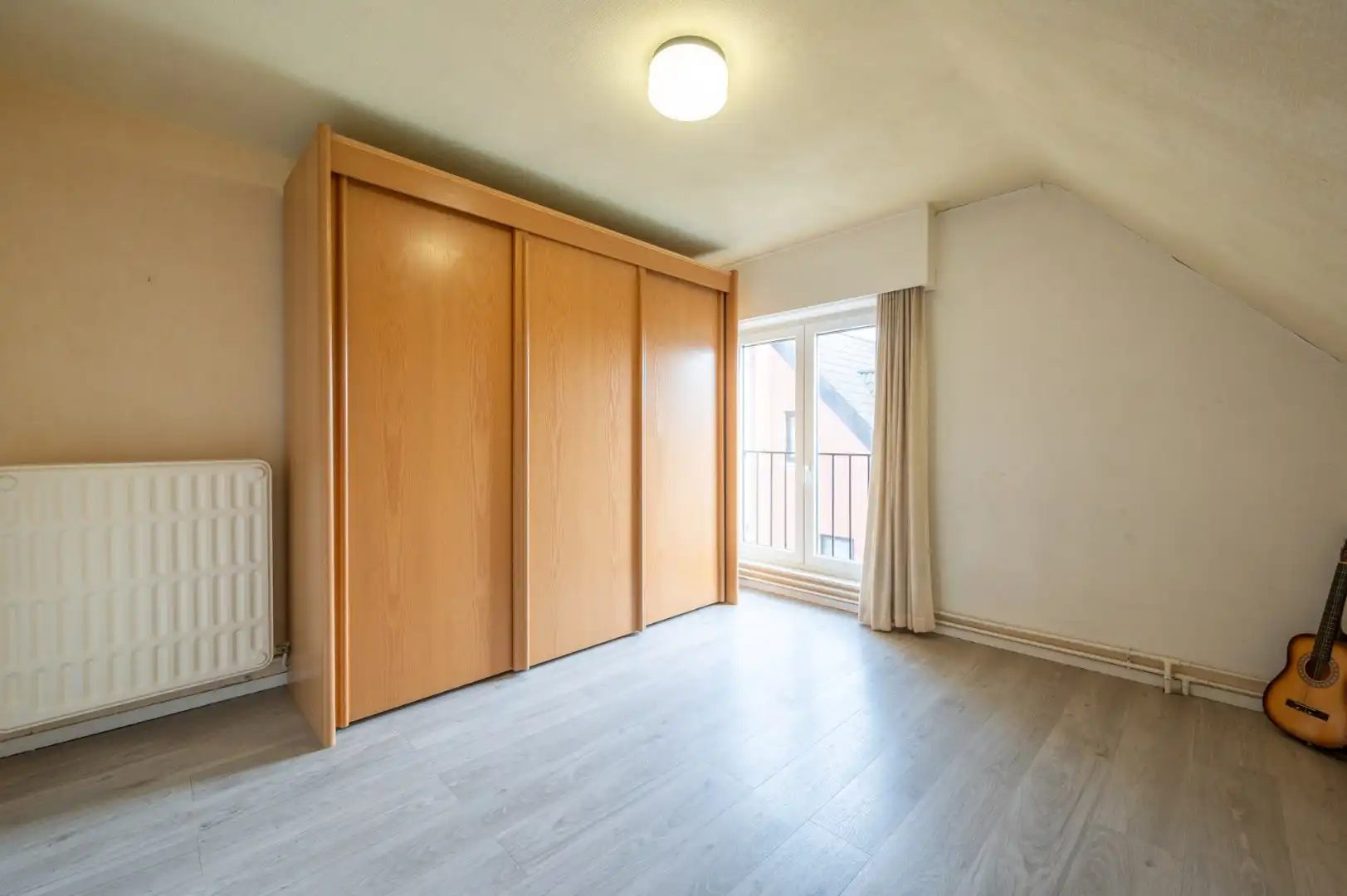 Halfopen woning met tuin en garage te St Kruis. foto 8