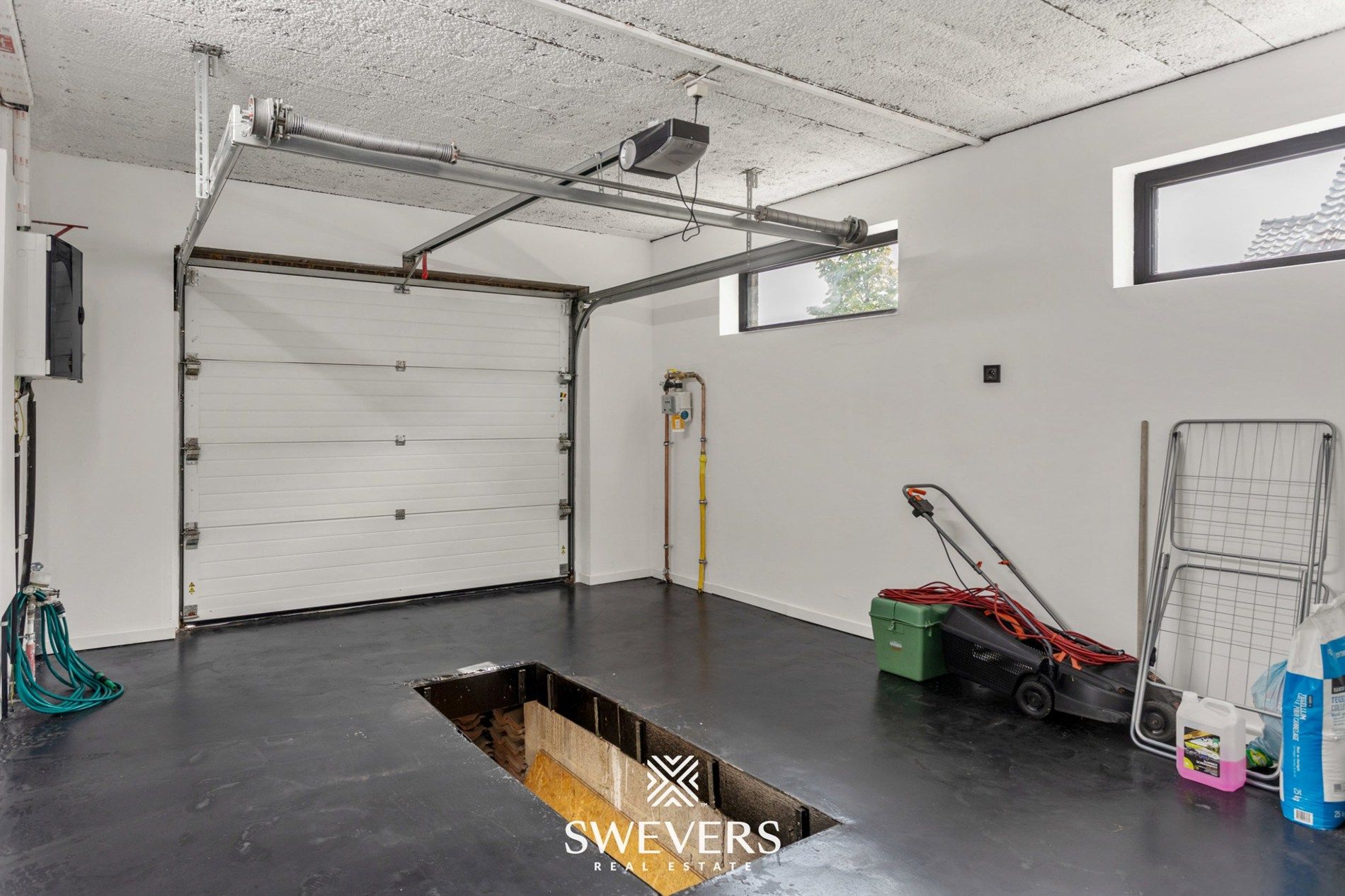 Volledig gerenoveerde gezinswoning met garage en tuin te Genk foto 24