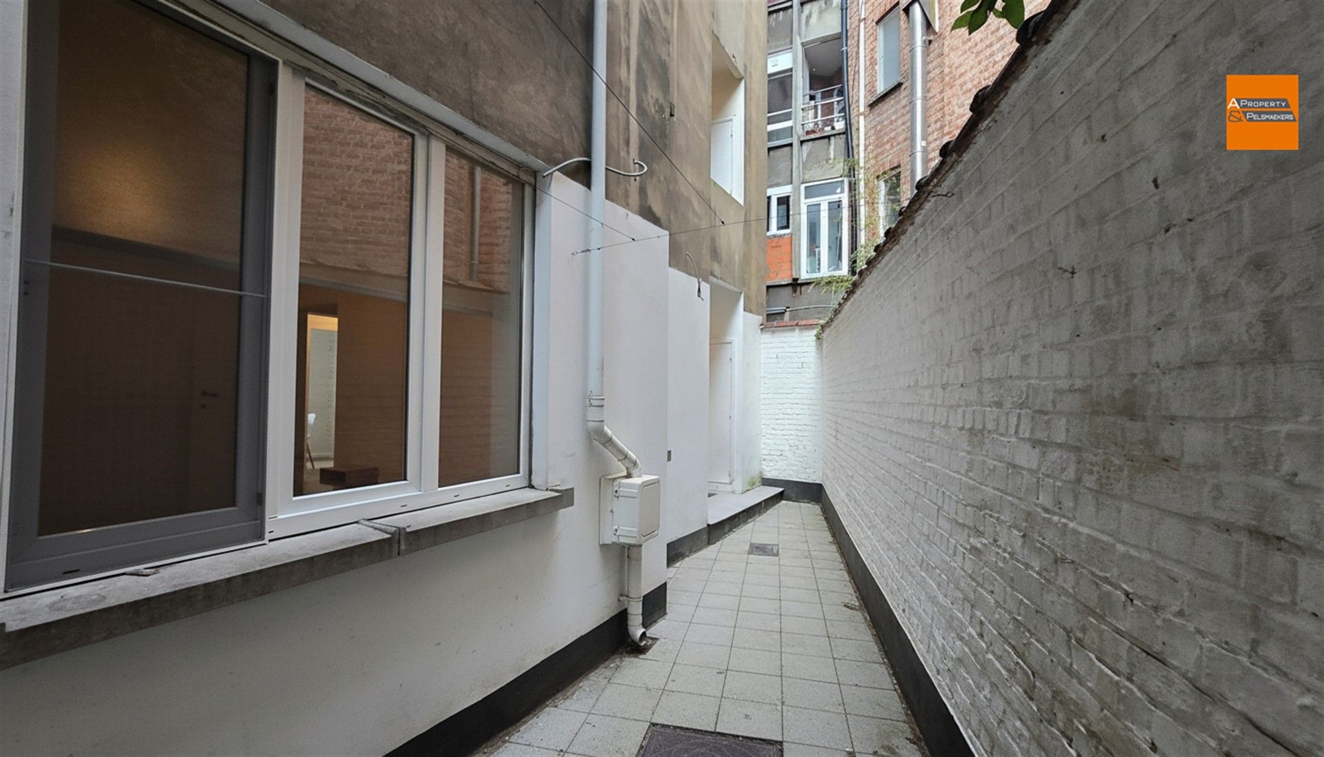 Opgefrist gelijkvloersappartement in Etterbeek foto 20