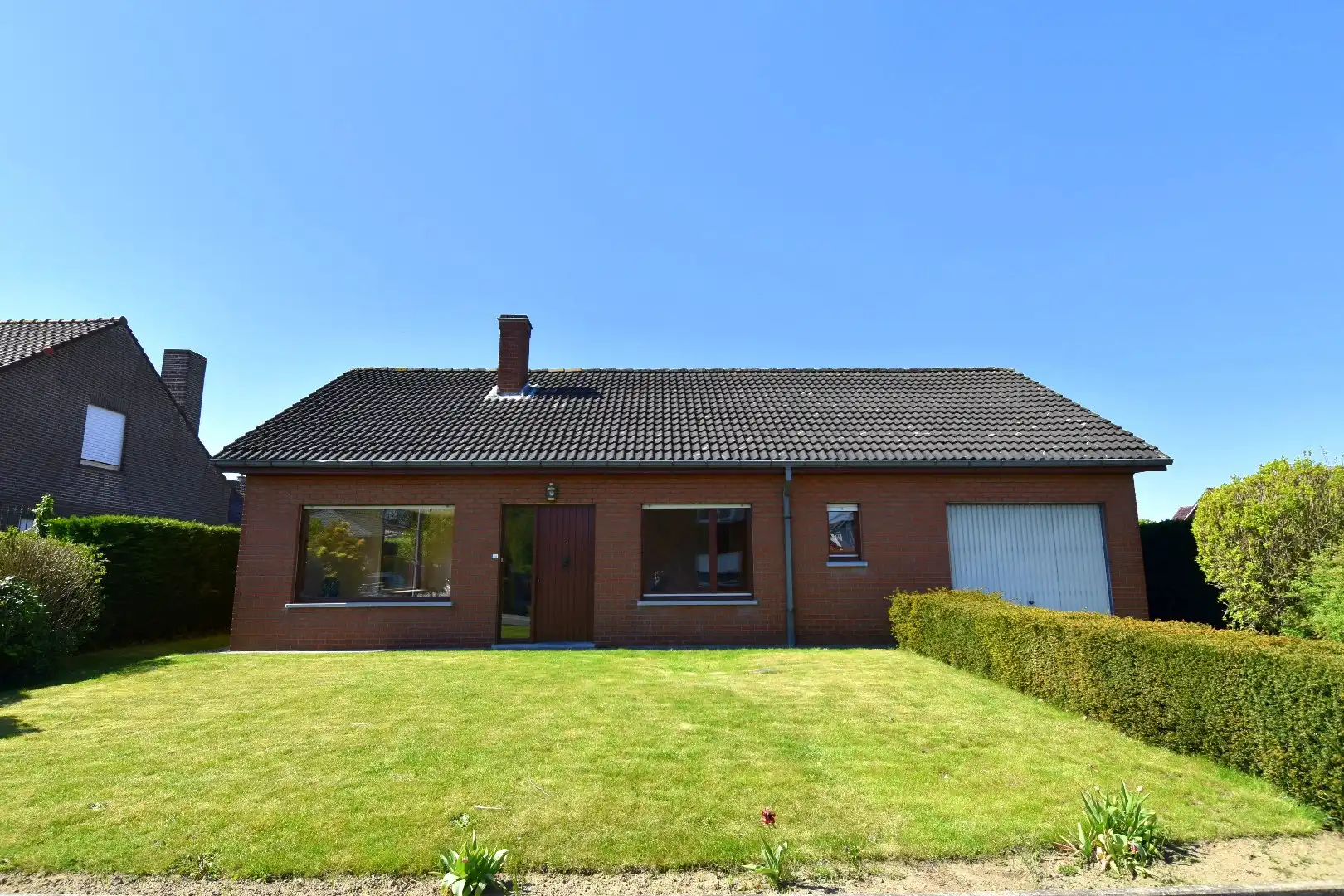 Ruime alleenstaande woning met 2 slaapkamers (mogelijkheid tot meer!), garage en zonnige tuin te koop in Gullegem foto 15