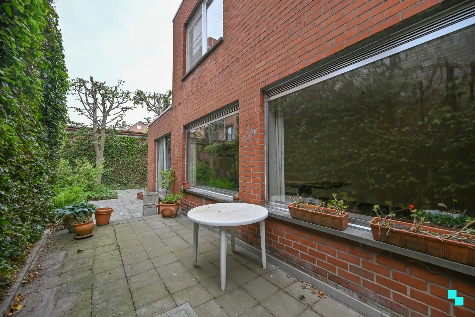 Centraal gelegen handelsruimte met bijhorende woonst en leuke stadstuin te Izegem foto 12