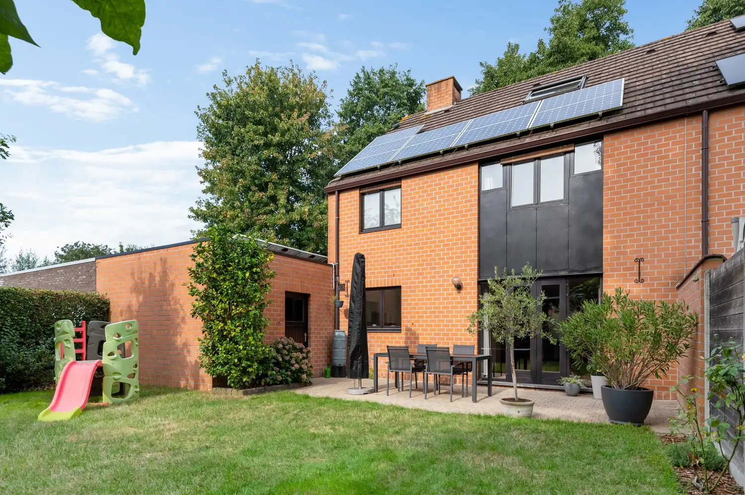 Energiezuinige halfopen woning met 4 slaapkamers en zuidgerichte tuin in Brasschaat foto 3