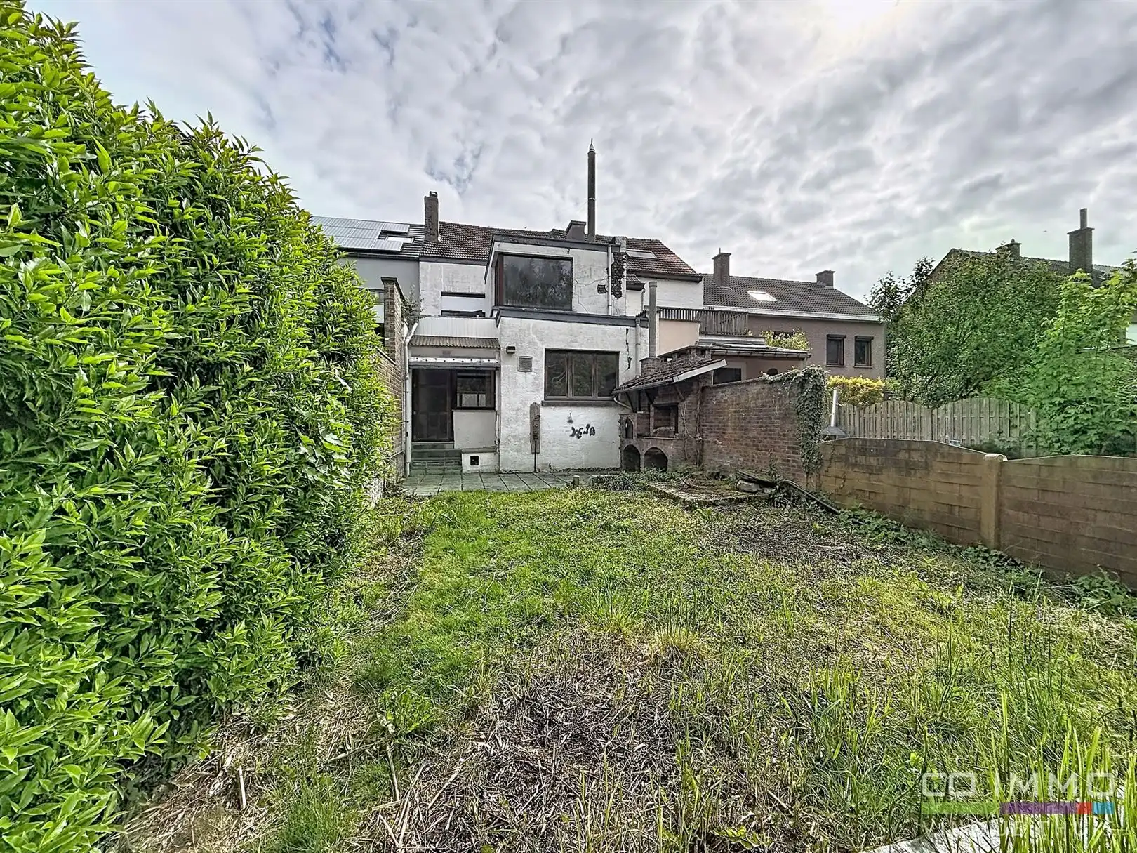 Ruime stadswoning met tuin, te renoveren, 2a 68ca foto 26