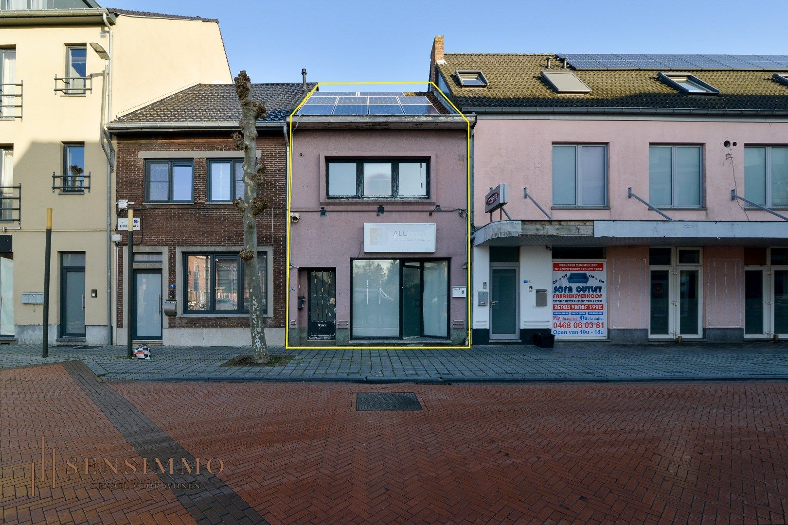 Handelshuis met zonnepanelen in centrum van Maasmechelen - Eisden foto {{pictureIndex}}