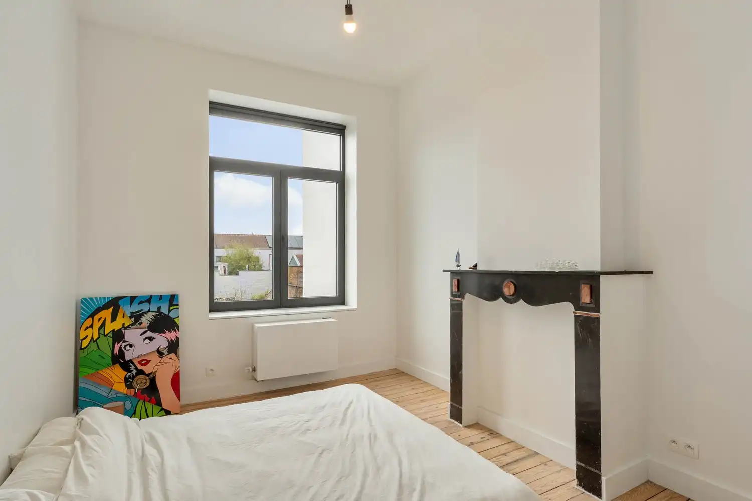 Prachtig gerenoveerd en energiezuinig herenhuis met 5 slaapkamers, 2 badkamers en een tuin op een toplocatie nabij het station van Leuven! foto 23