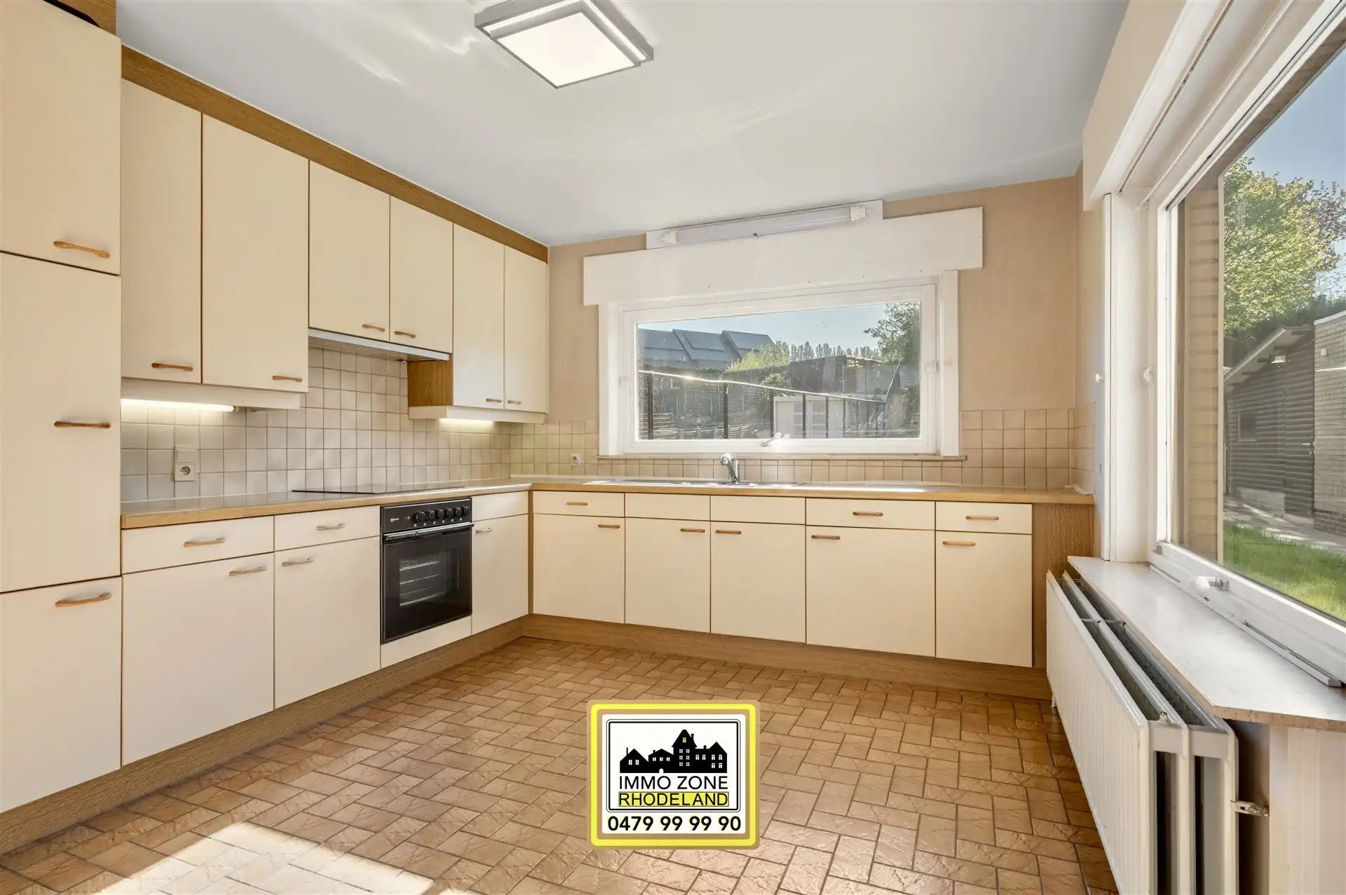 Op te frissen halfopen woning met 3 slpks, garage en tuin foto 9