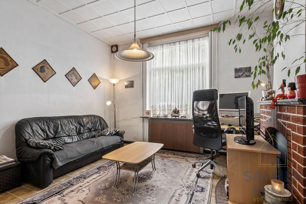 Ruime verhuurde woning met uitweg foto 2