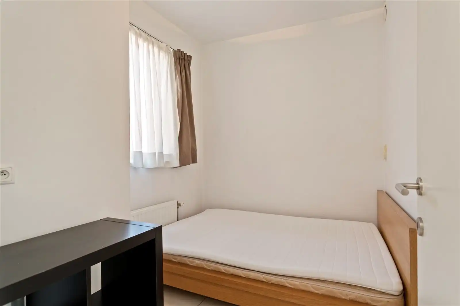 Stijlvol en volledig gemeubeld 2 slaapkamer appartement op toplocatie! foto 5