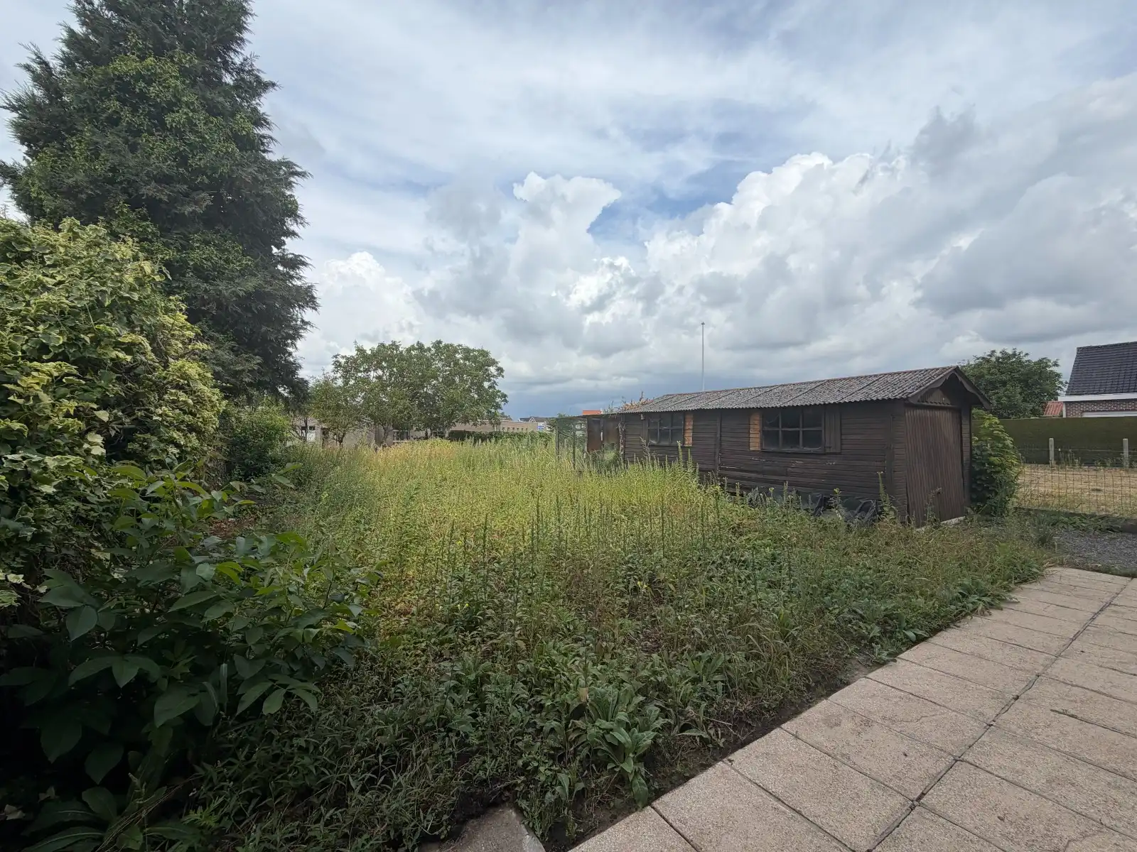Ruime woning met 4 slaapkamers, garage en tuin foto 17