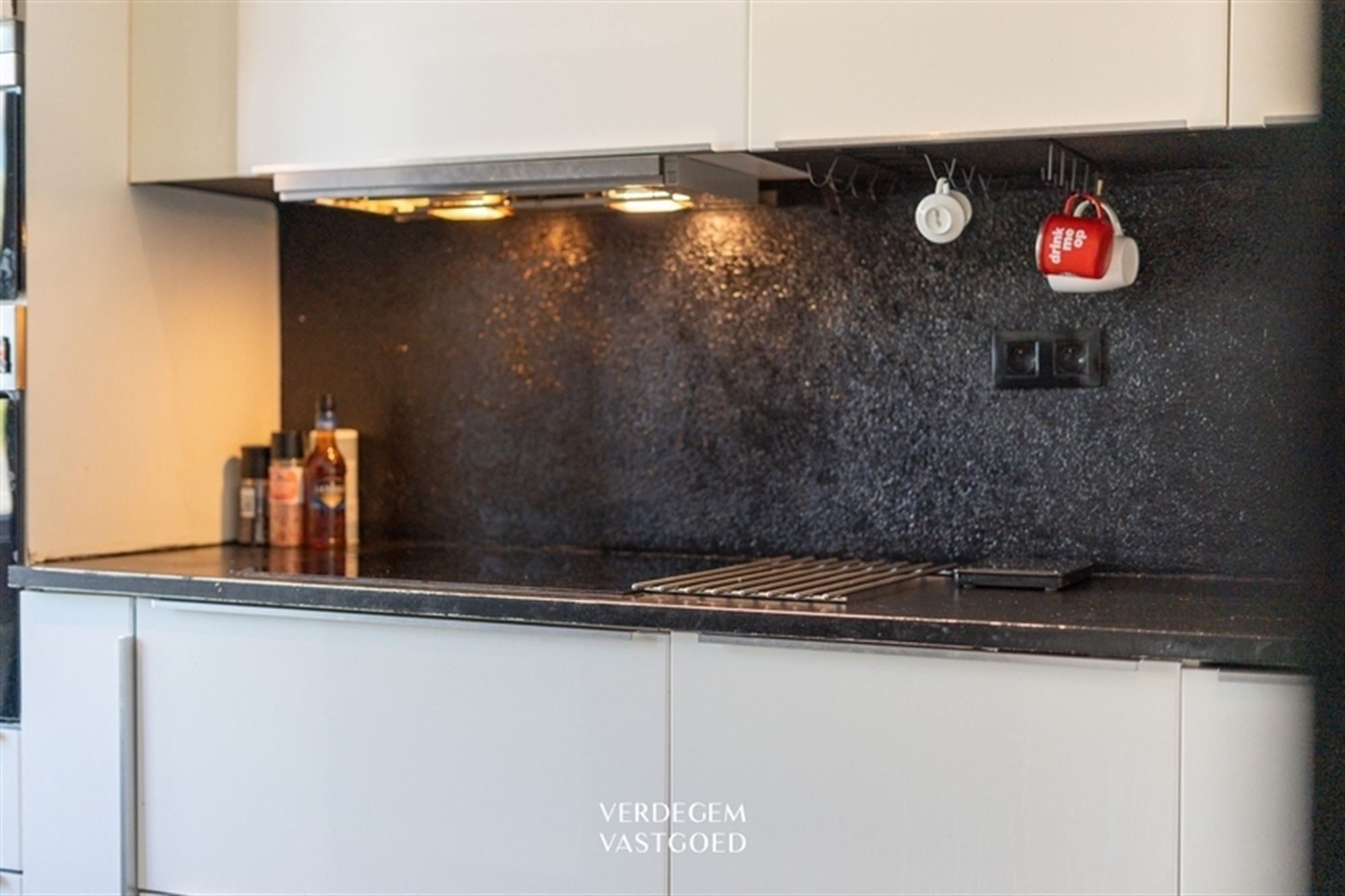 Zeer bereikbare gezinswoning met 4 slaapkamers en paadje naar zonnige tuin foto 4