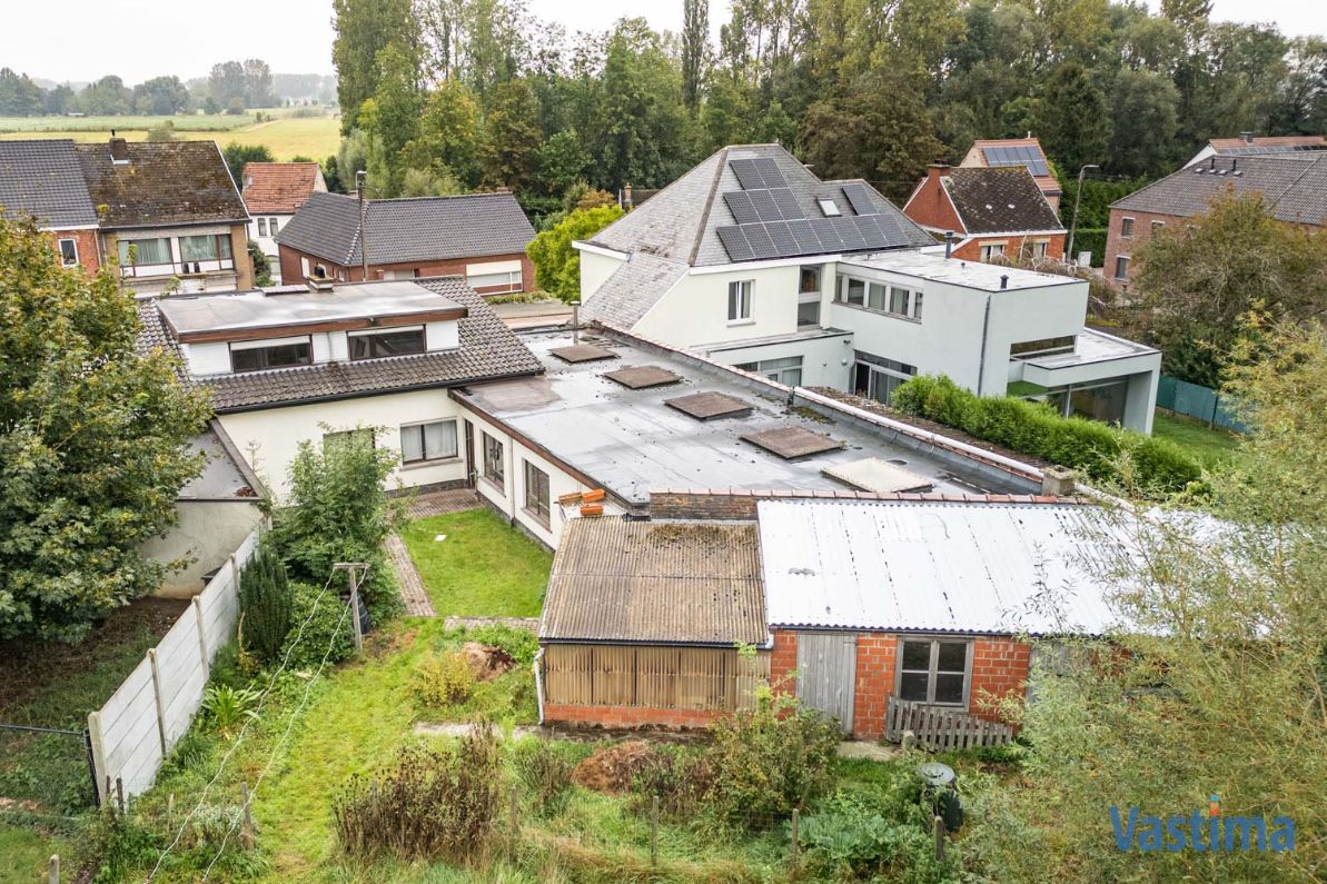 Gezinswoning met grote loods op een prachtig perceel foto 42