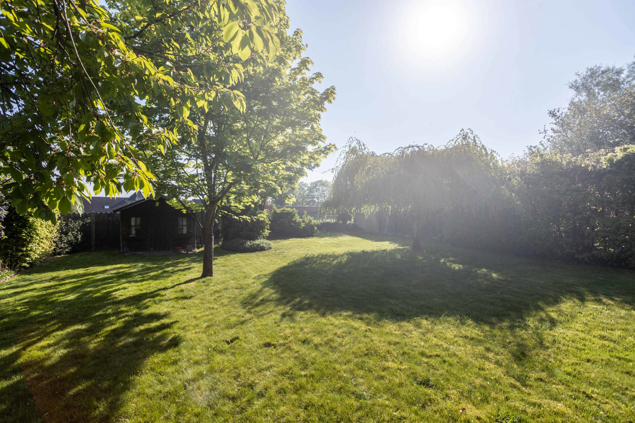 Unieke burgerwoning met tuin en perceel bouwgrond met garage foto 15
