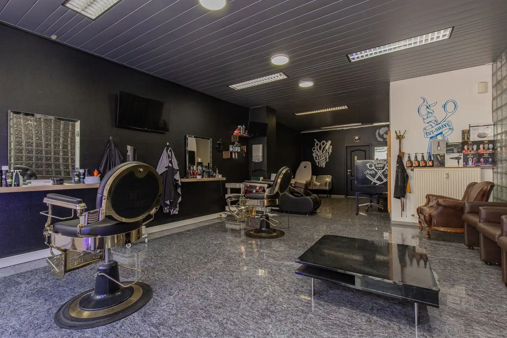Opbrengsteigendom met handelsruimte en verhuurd duplex appartement in het centrum van Willebroek foto 2
