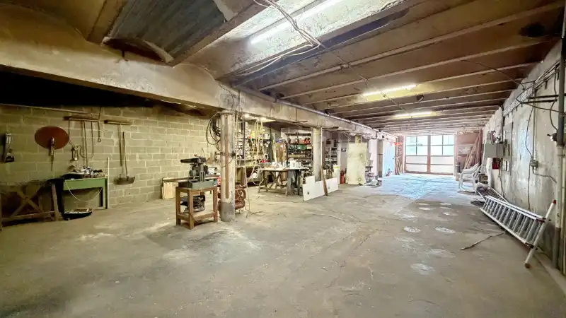 Opbrengsteigendom met 7 appartementen + ruime garage-magazijn 150m² foto 4