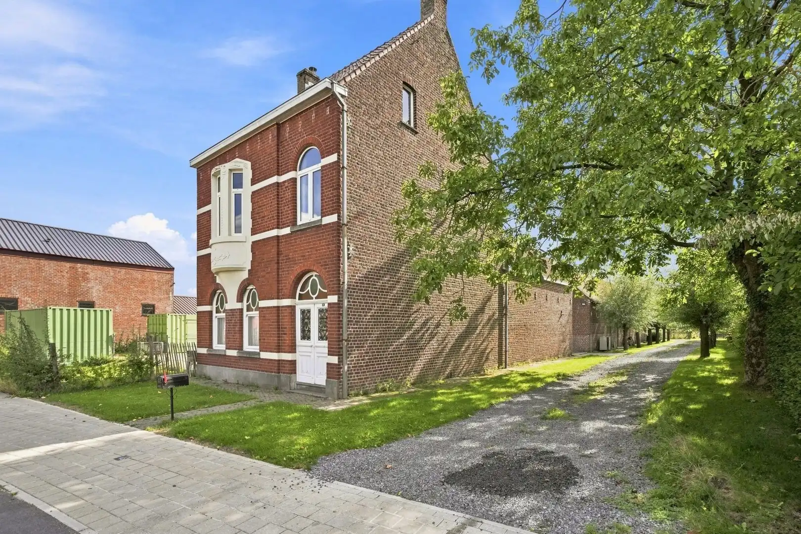 Karaktervol interbellum huis met bijgebouw én bouwgrond op 7.782 m² foto 5