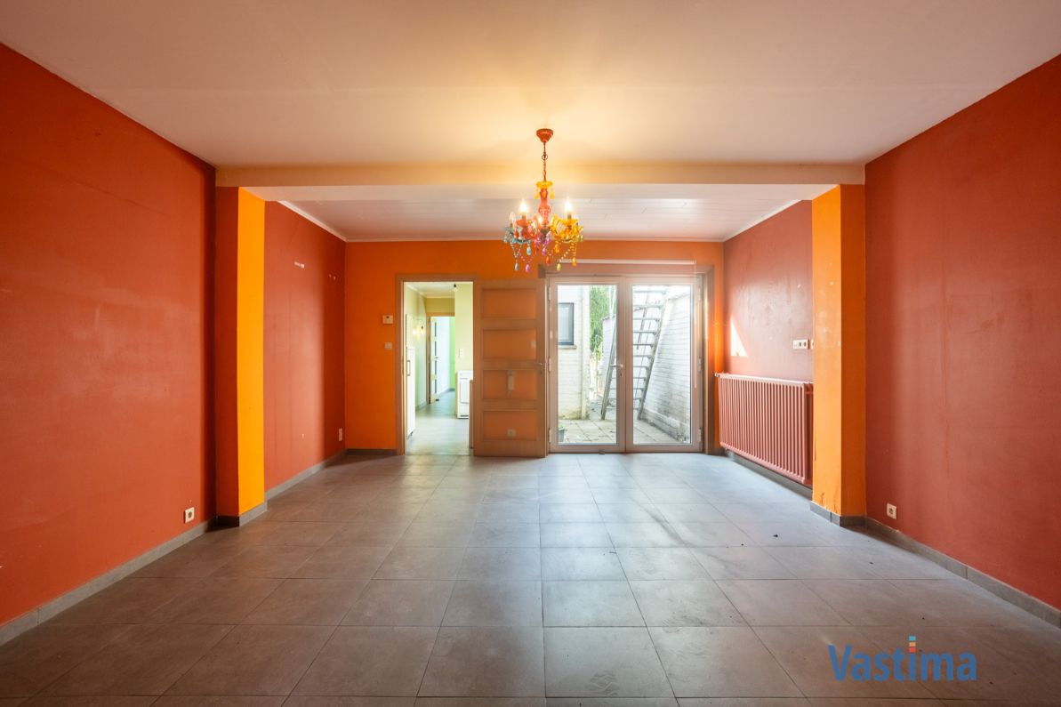 Solide rijwoning met garage en tuin in het hart van Aalst foto 4