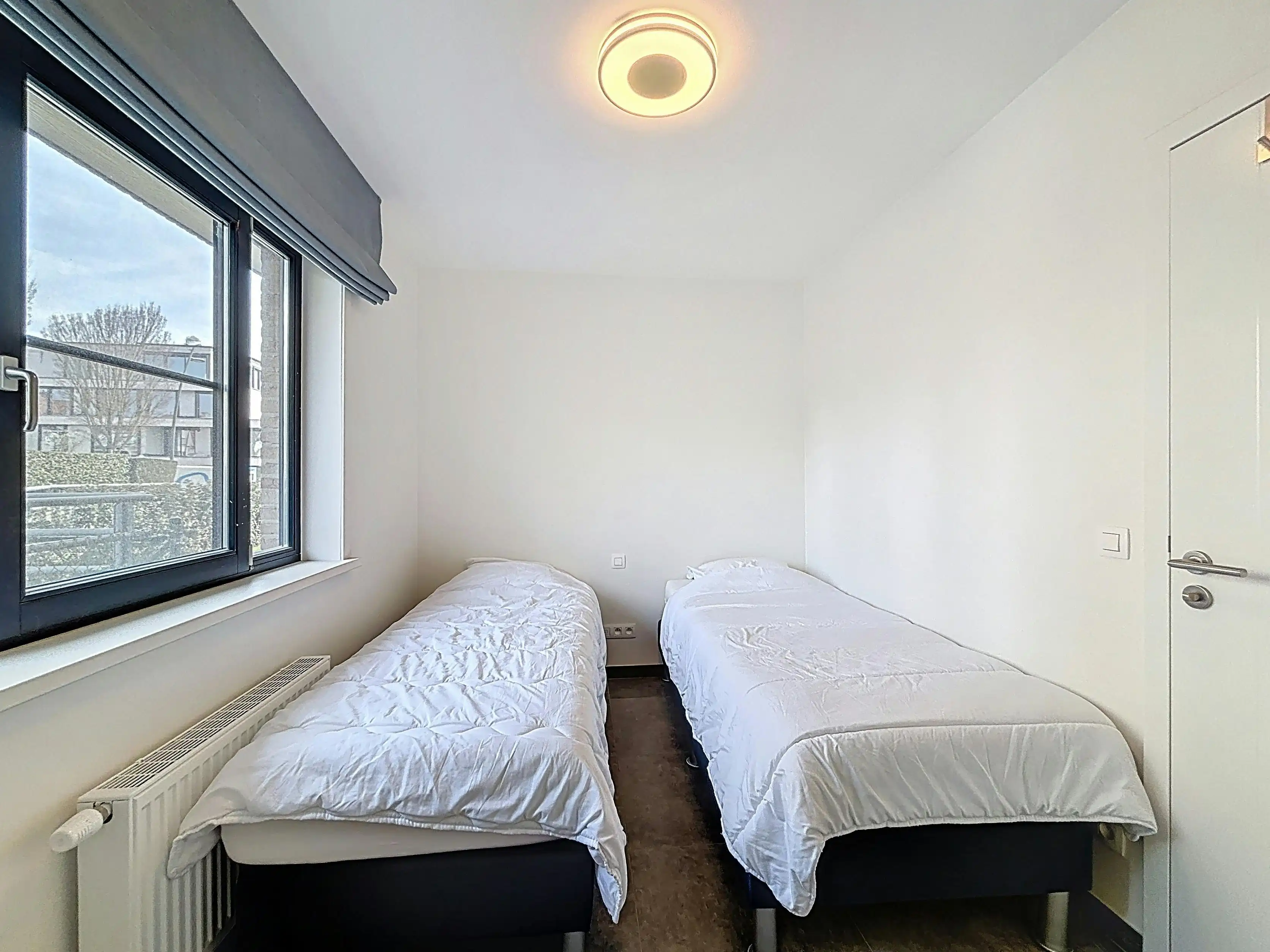 Appartement met 2 slaapkamers en parking in het centrum  foto 10