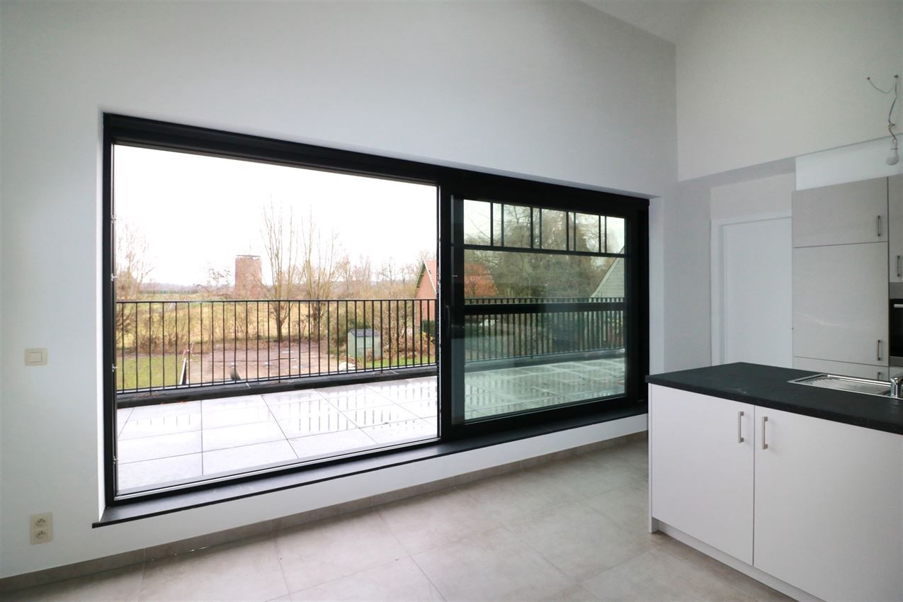 Unieke duplex met twee slpk, terras, autostaanplaats, label A foto 39