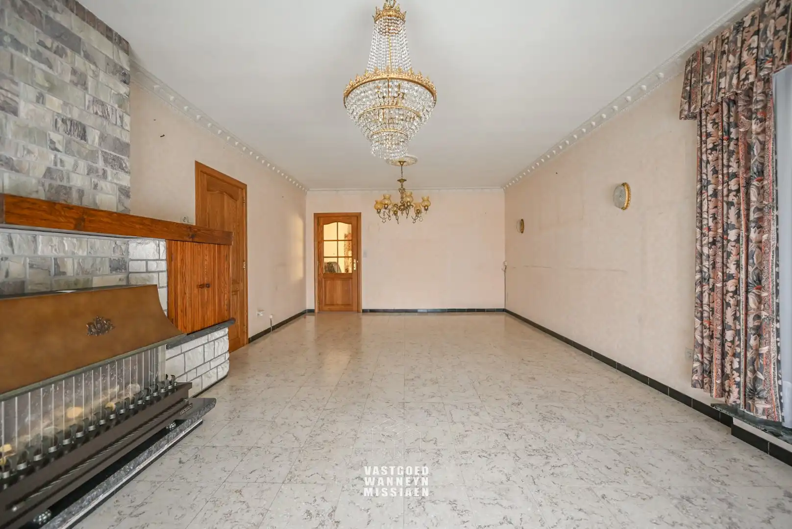 Te renoveren gelijkvloerse woning met  3slpk, garage, tuin op 1290m2 foto 6