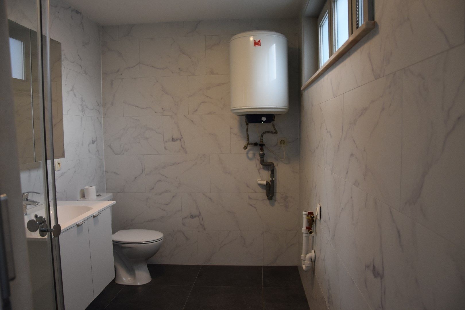 Opgefriste rijwoning met stadskoertje foto 3