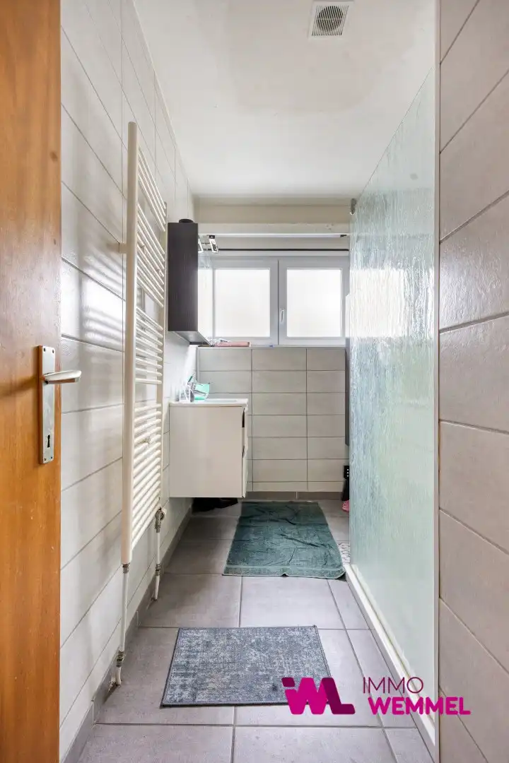 Ruim 2-slaapkamerappartement met terras, garagebox foto 17