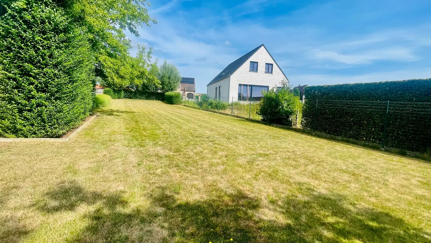 Bouwgrond van 1.264 m² te koop in groene omgeving – Ruddervoorde foto {{pictureIndex}}