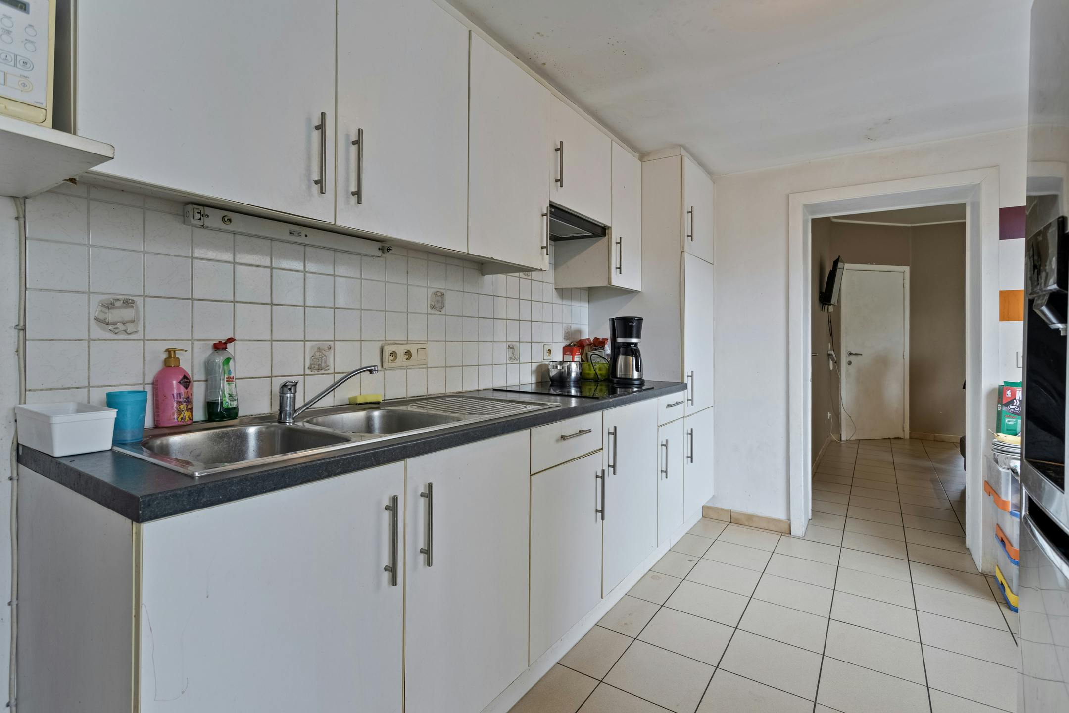 Op te frissen huis met tuin te koop in Brugge centrum foto 8