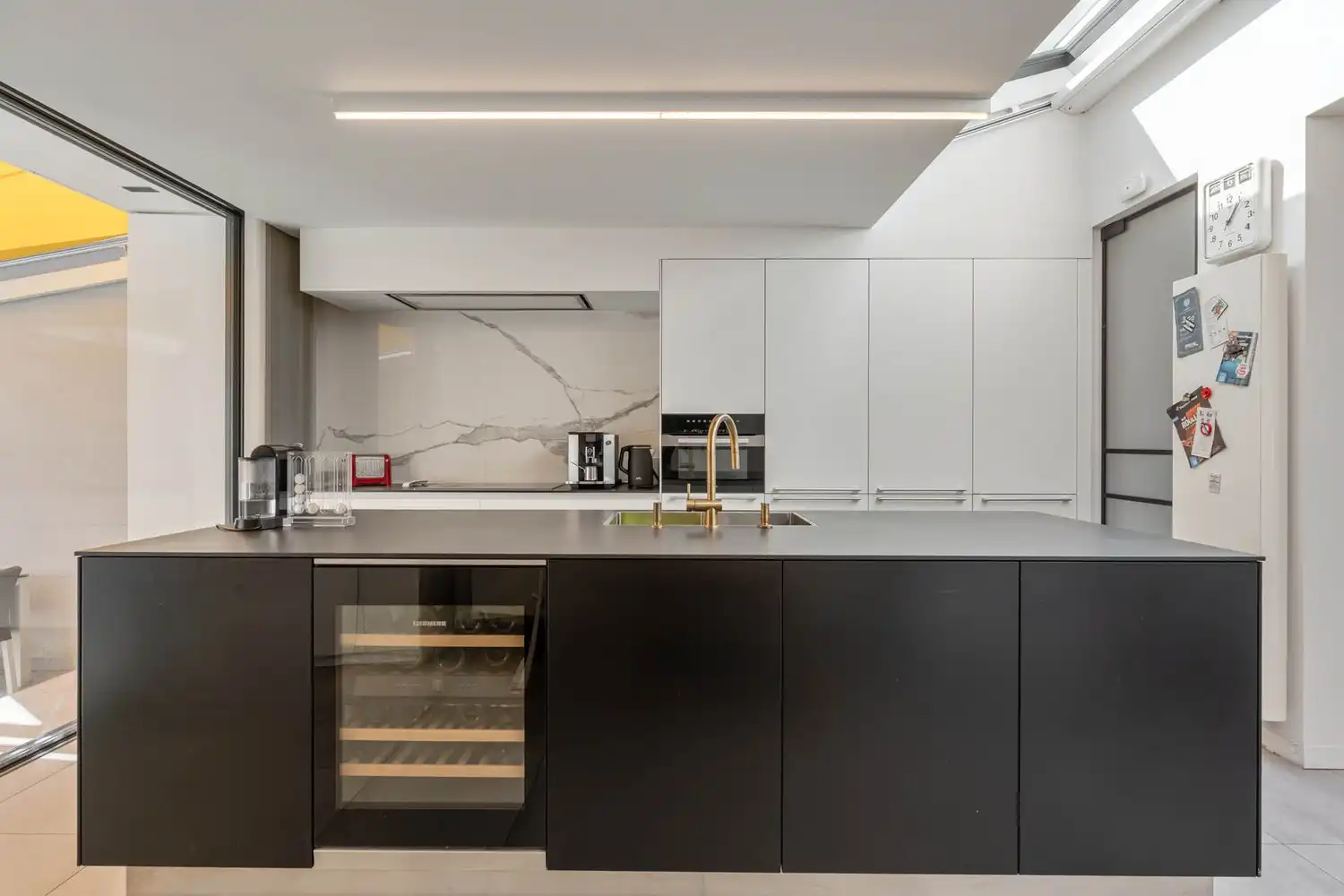 Gerenoveerde en energiezuinige(B-label) woning met 3 slaapkamers, 2 badkamers, een dressing, een garage met een oprit en een tuin nabij het station van Leuven! foto 11
