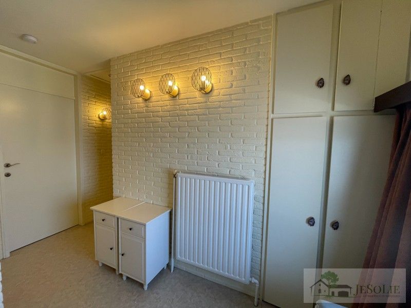 Handelspand + ruim appartement  met potentieel foto 17