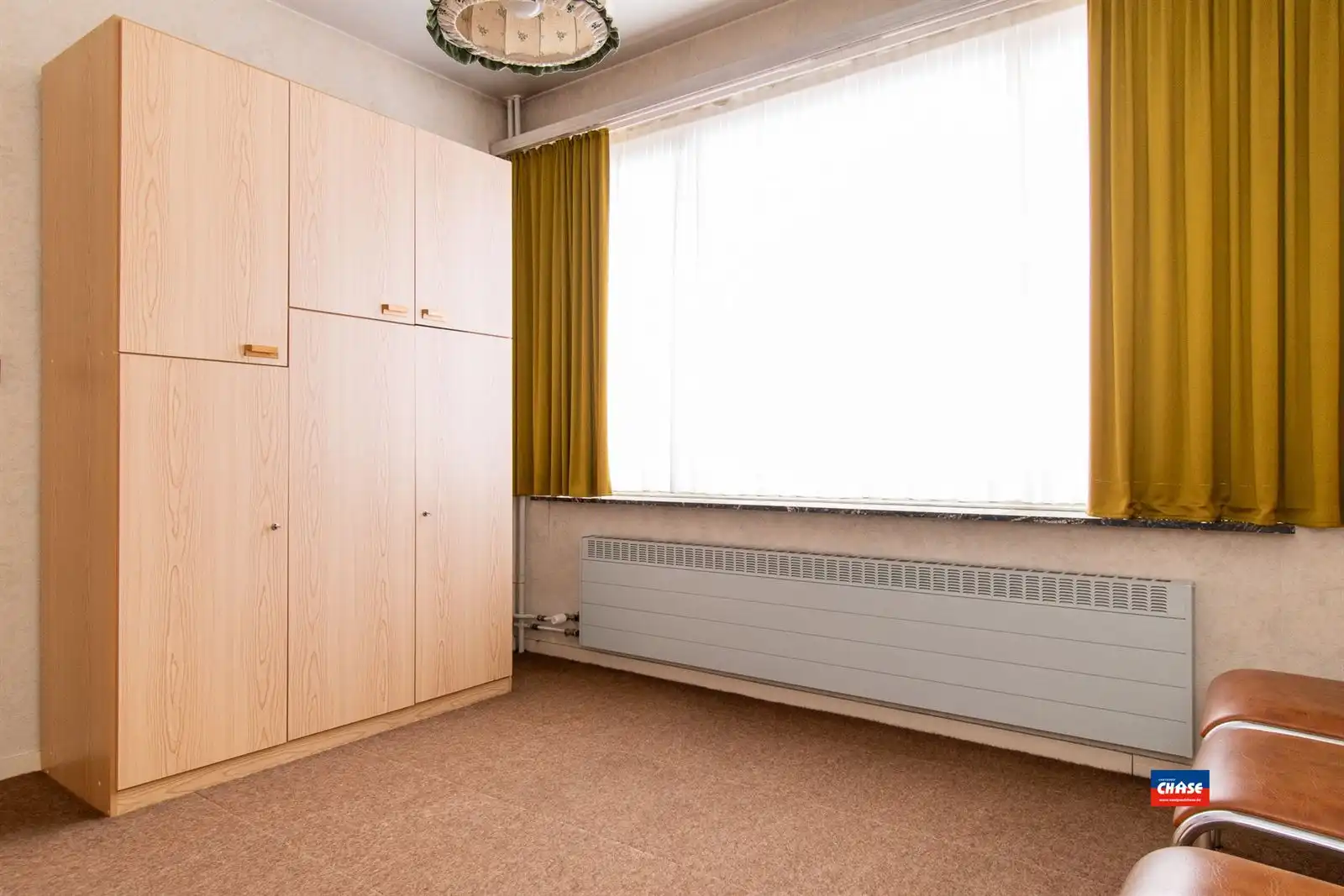 Halfopen bebouwing met 3 slaapkamers, tuin + 3 garageboxen foto 17