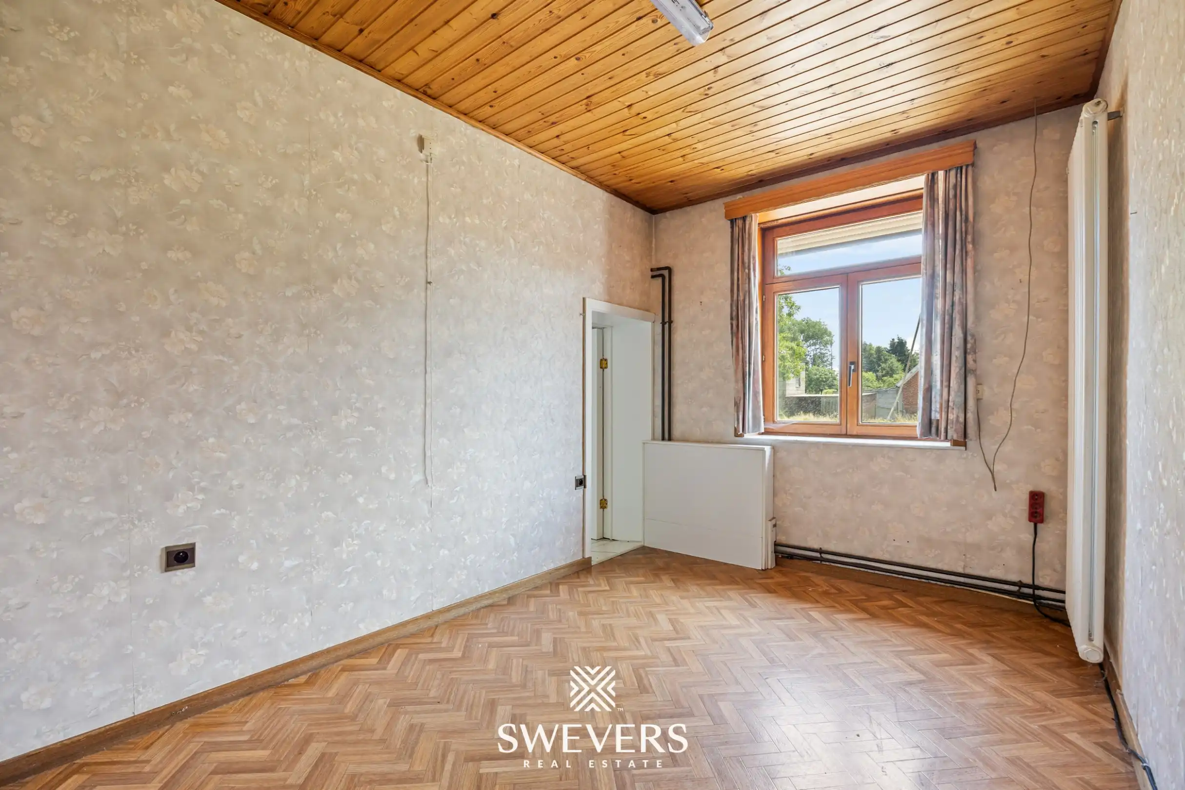 Vrijstaande woning met groot perceel en enorm renovatiepotentieel in Herk-de-Stad foto 16