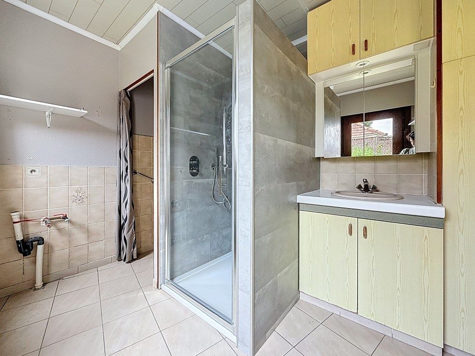 Charmante woning met grote tuin én garage in het centrum van Zarren foto 8