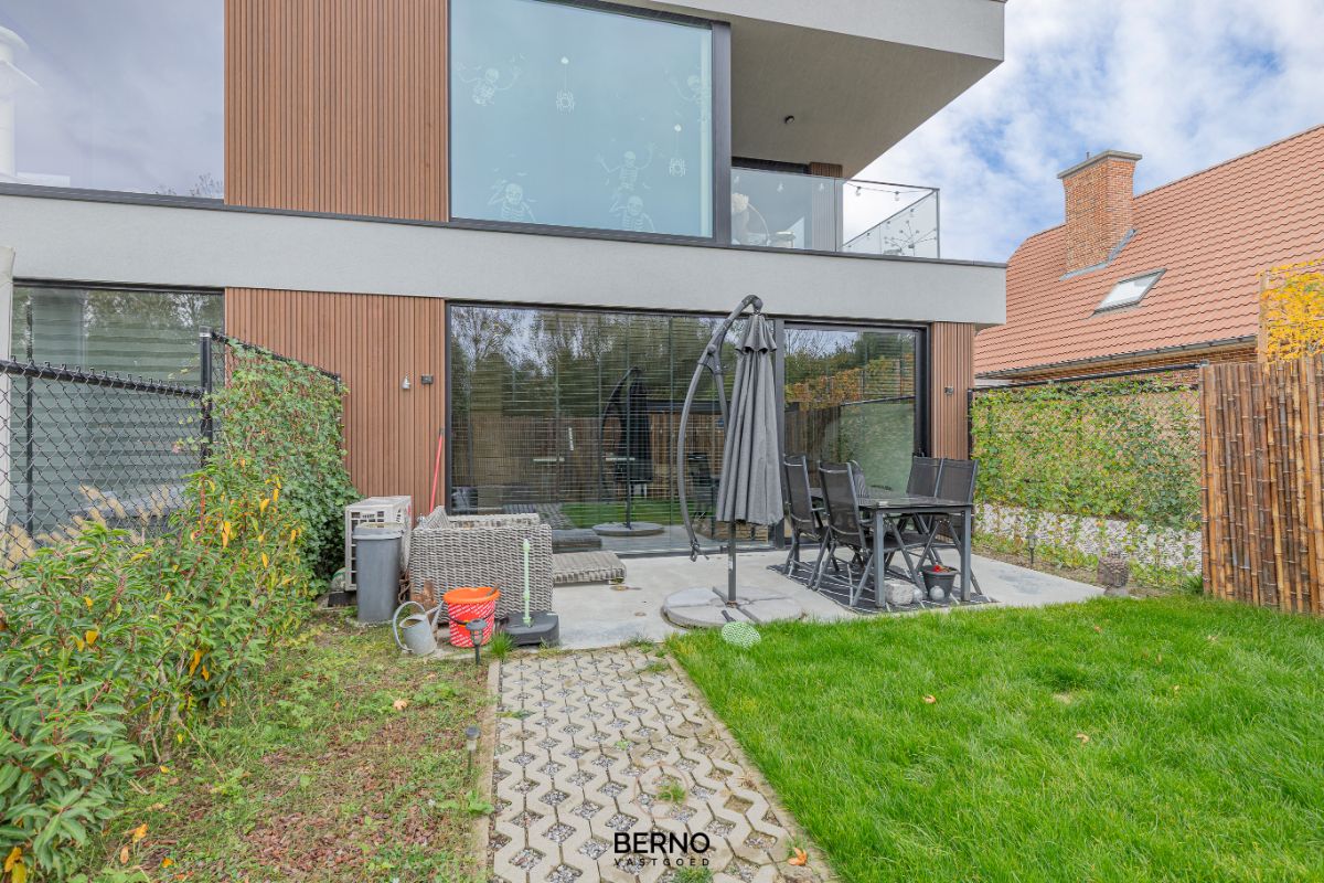 Recent gelijkvloers appartement met zonnig terras en tuintje in Opstal foto 16