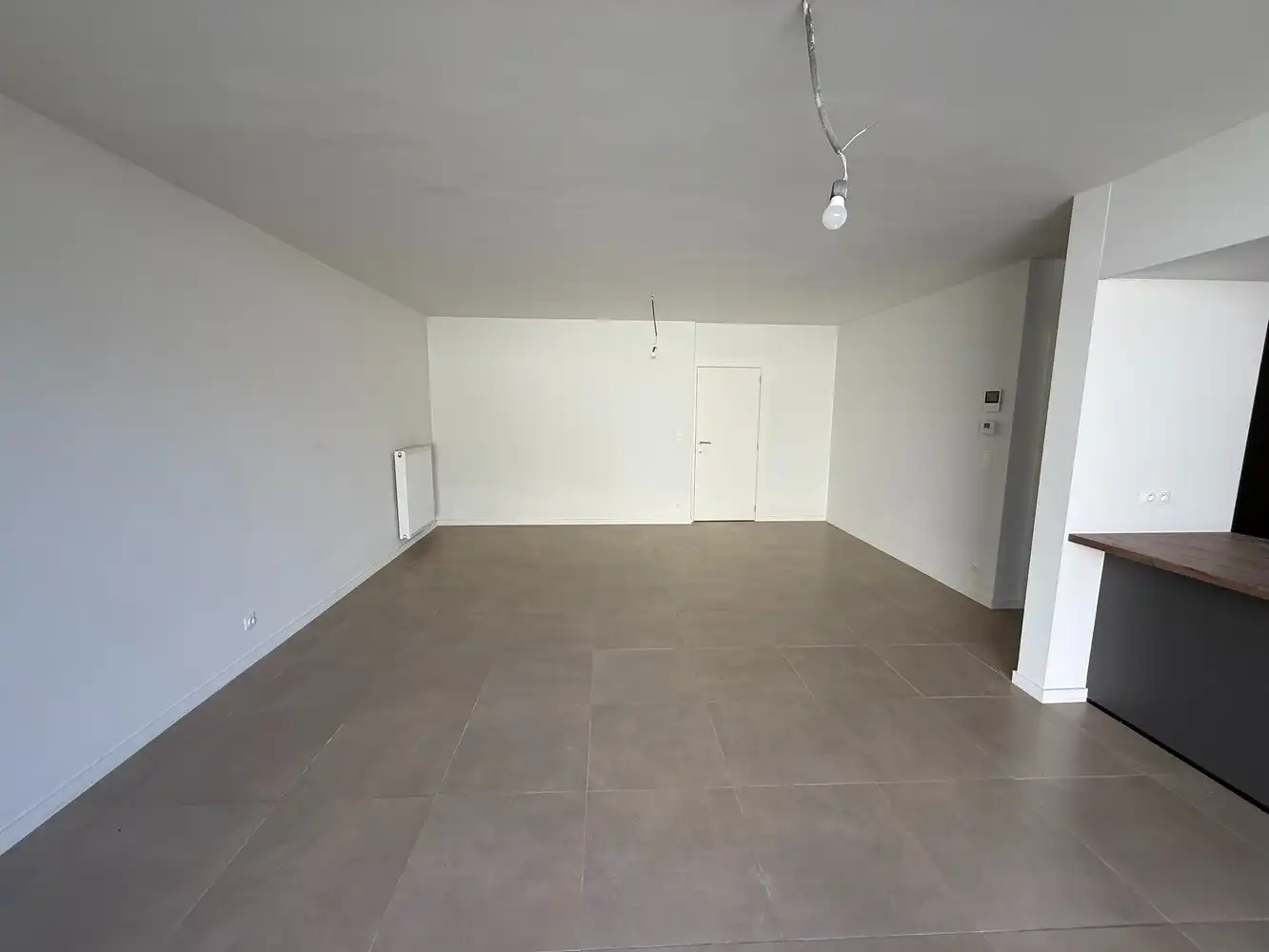 Ruim nieuwbouwappartement met 2 slaapkamers én parkeerplaats! foto 3