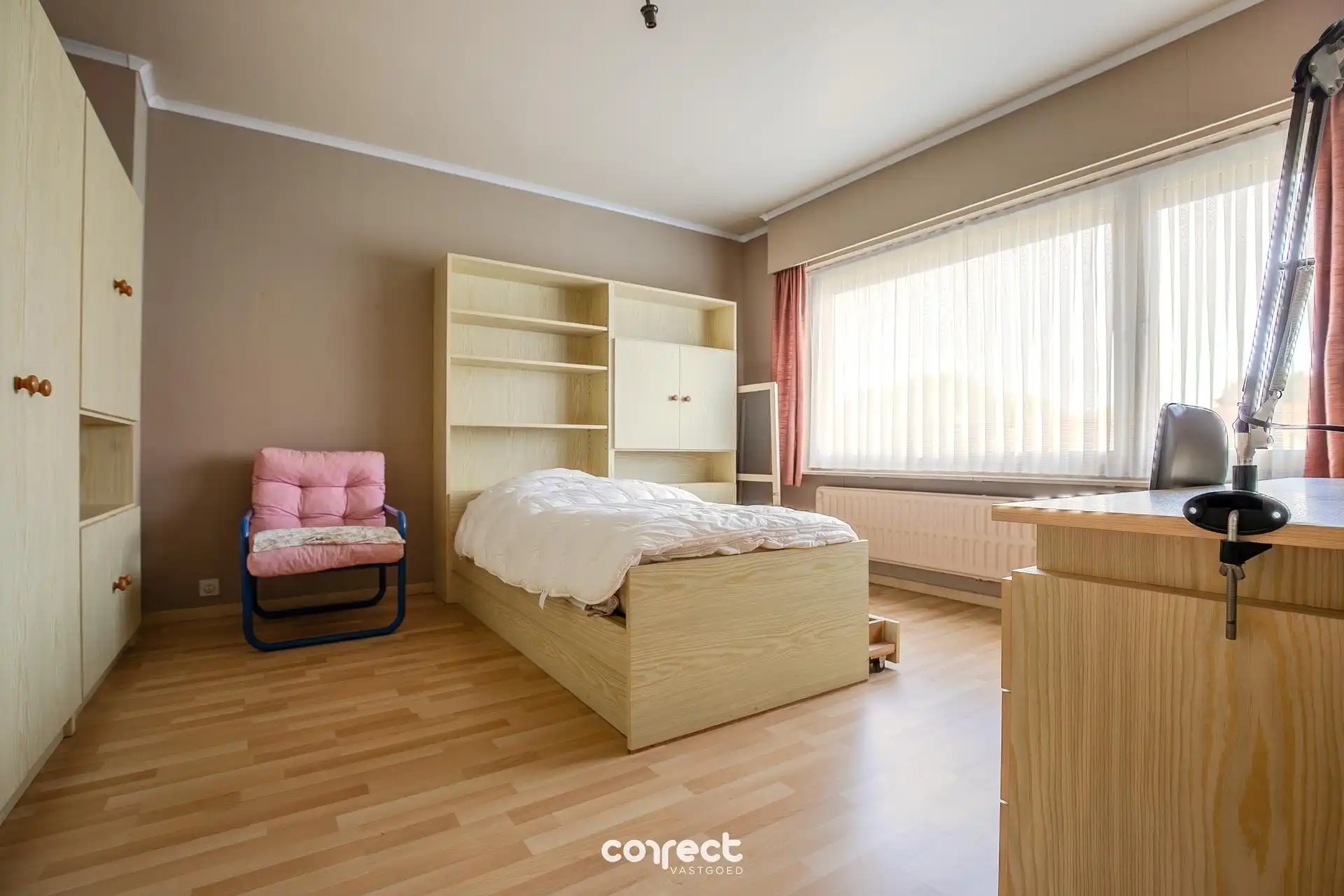 Heel goed onderhouden gezinswoning, met garage, zongerichte tuin en 3 ruime slaapkamers. foto 12