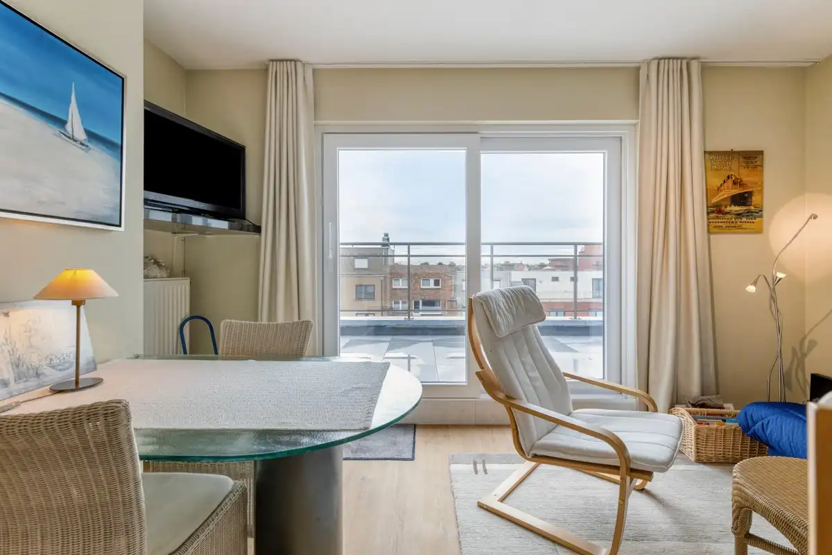 Appartement met 1 slaapkamer en twee ruime zonneterrassen, met een parkeerplaats in het gebouw die samen met het appartement aangekocht dient te worden. foto 4