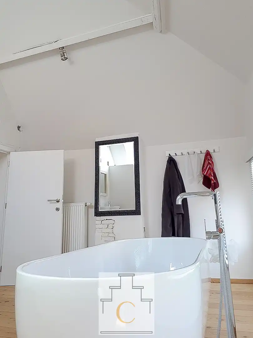 Trendy stadswoning - totaalrenovatie, strakke lijnen en een keitof terras - topligging Moerstraat foto 17