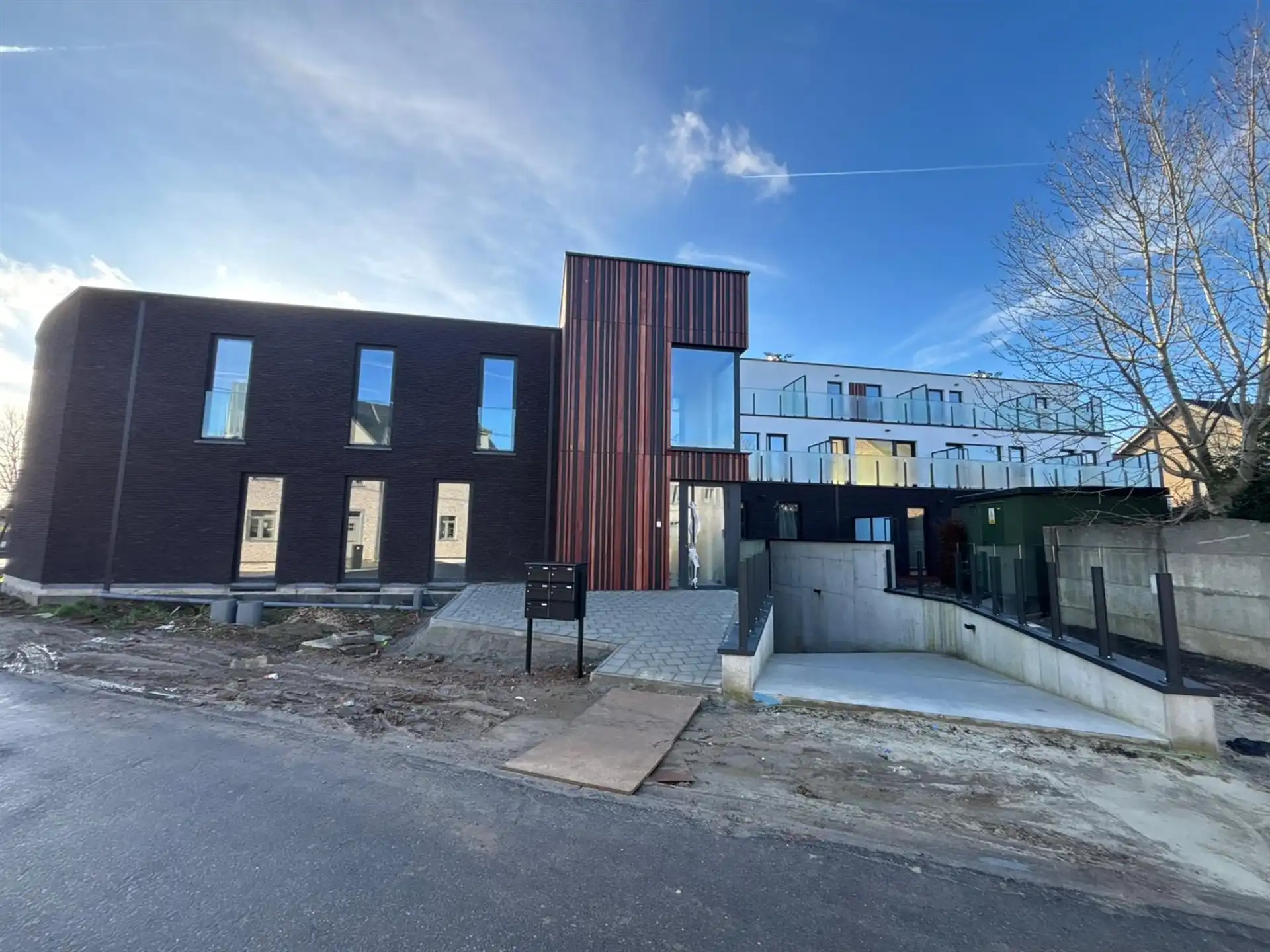 Modern duplex-appartement met private tuin en ruime terrassen in Asse! foto {{pictureIndex}}