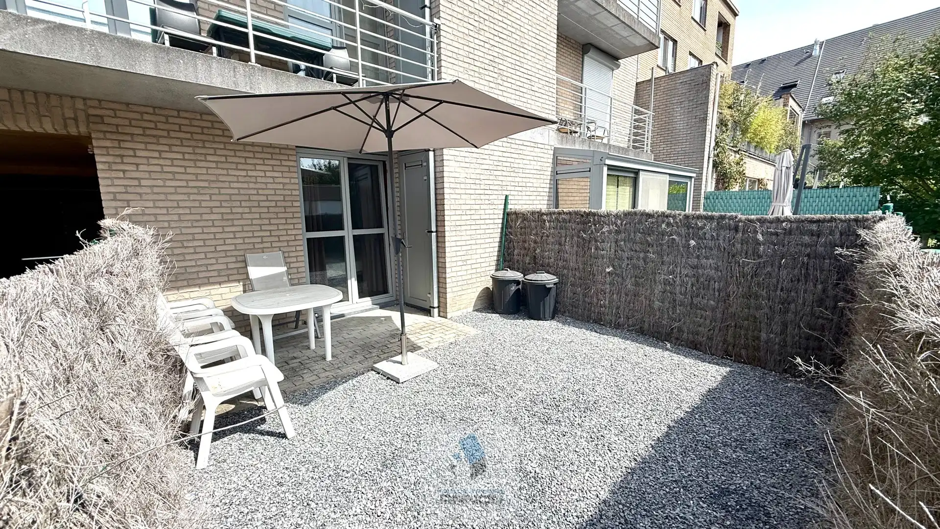 Gezellig gelijkvloers appartement met 1 slaapkamer, stadstuintje en privatieve autostaanplaats foto 16