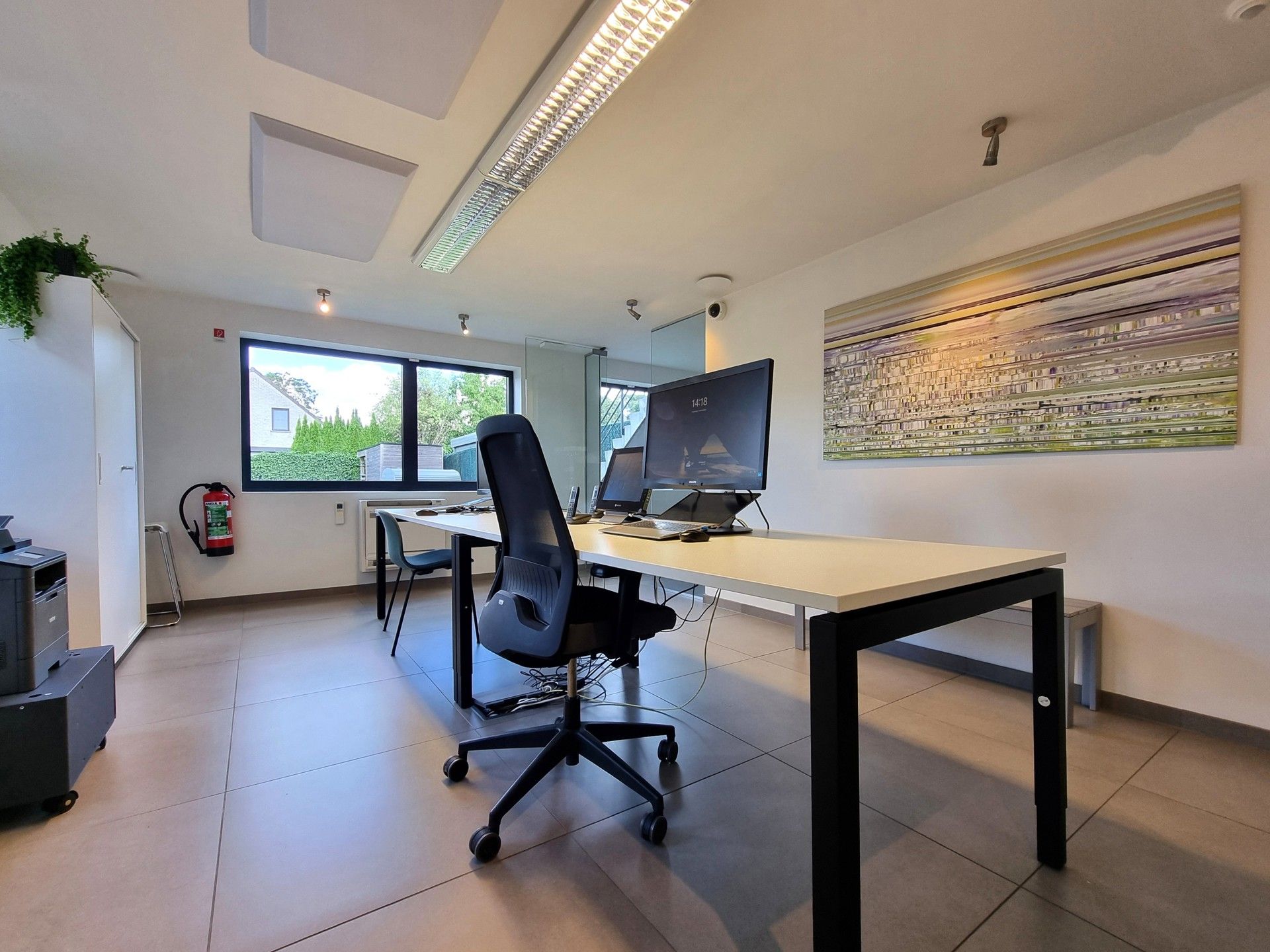 Handelsgelijkvloers met triplex-appartement in het hartje van Pamel foto 8