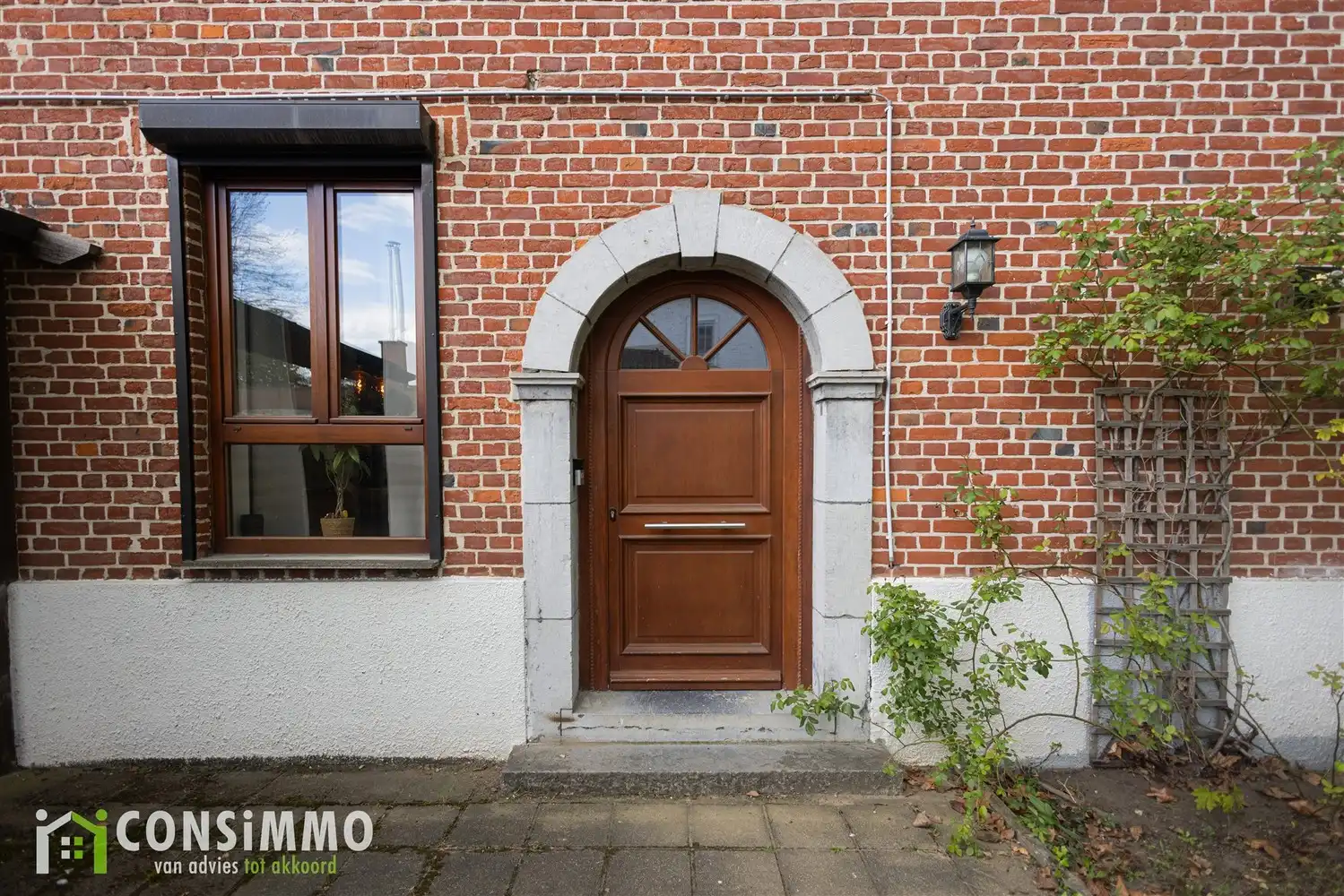 Karaktervolle en energiezuinige gezinswoning met zonnige tuin in Genk foto 3