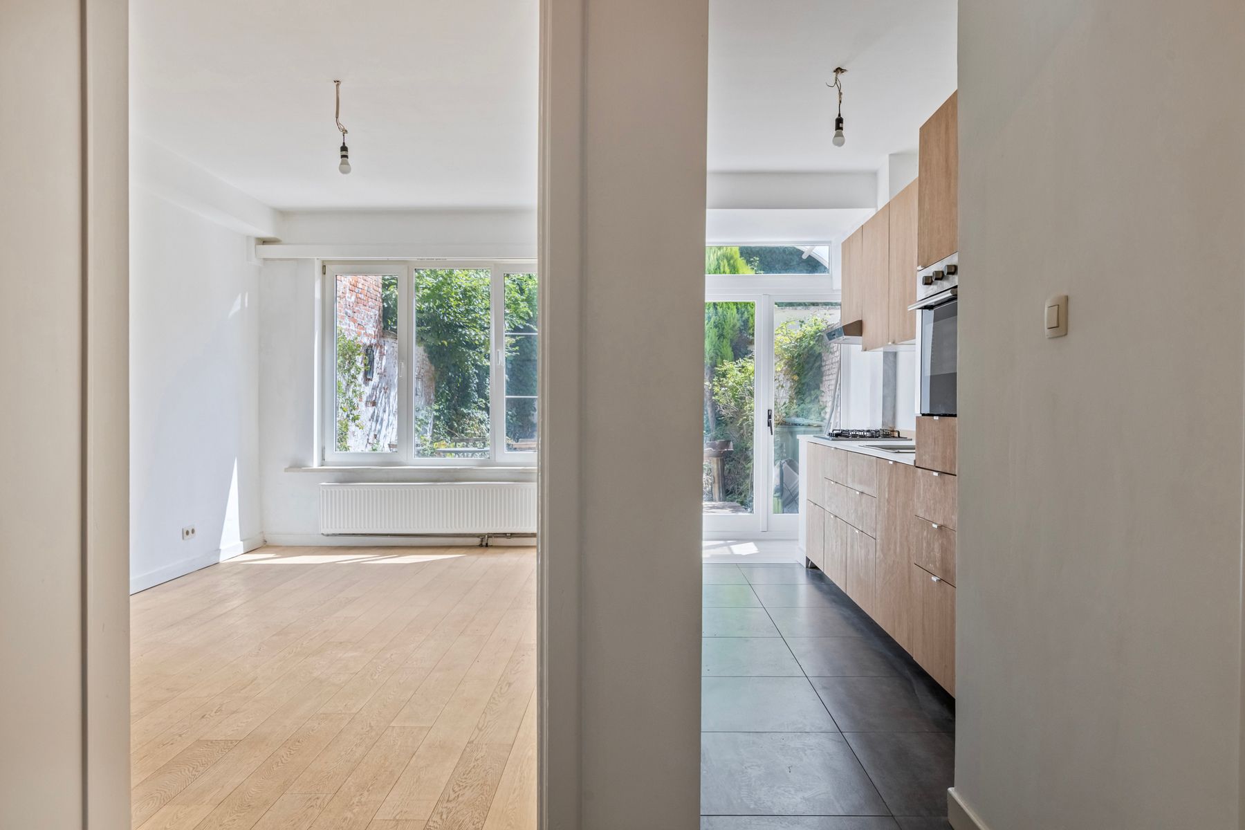 Instapklaar 1-slaapkamerappartement met ruime tuin. foto 5