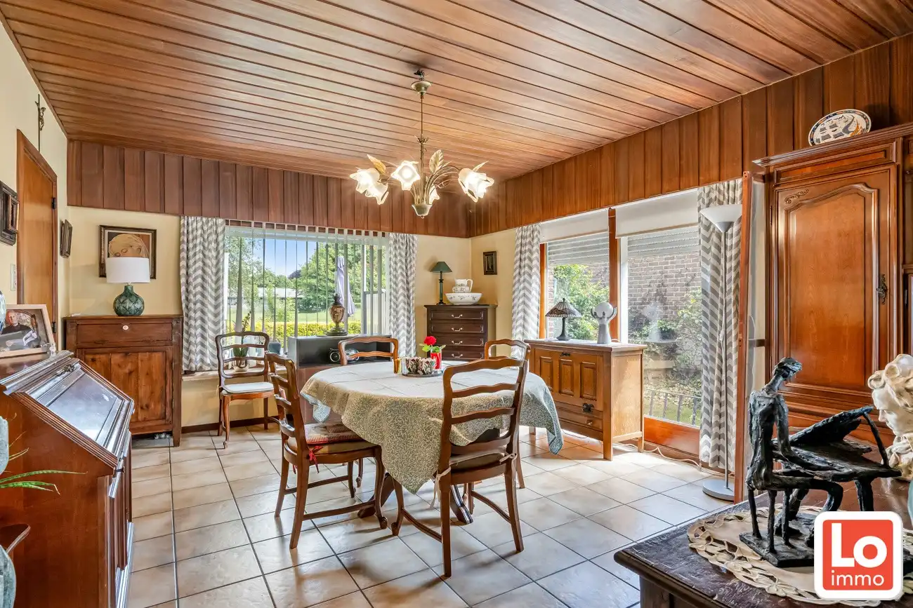 IN OPTIE! Te renoveren gelijkvloers woning met een open zicht op de achterliggende velden. foto 6